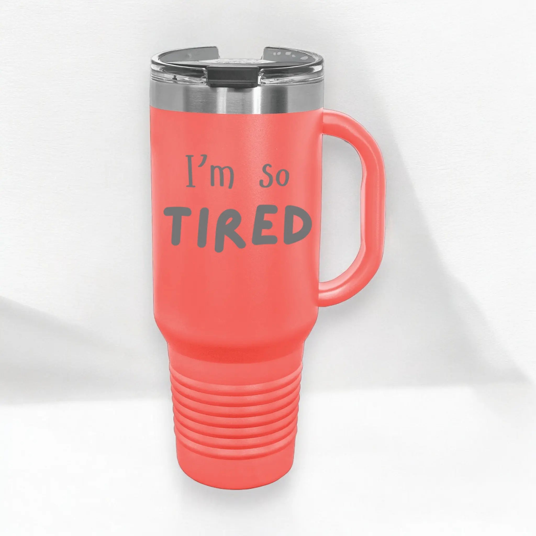 Hand holding 40oz laser etched "I'm So Tired" tumbler with straw - tired mom cup insulated for coffee-dependent exhaustion