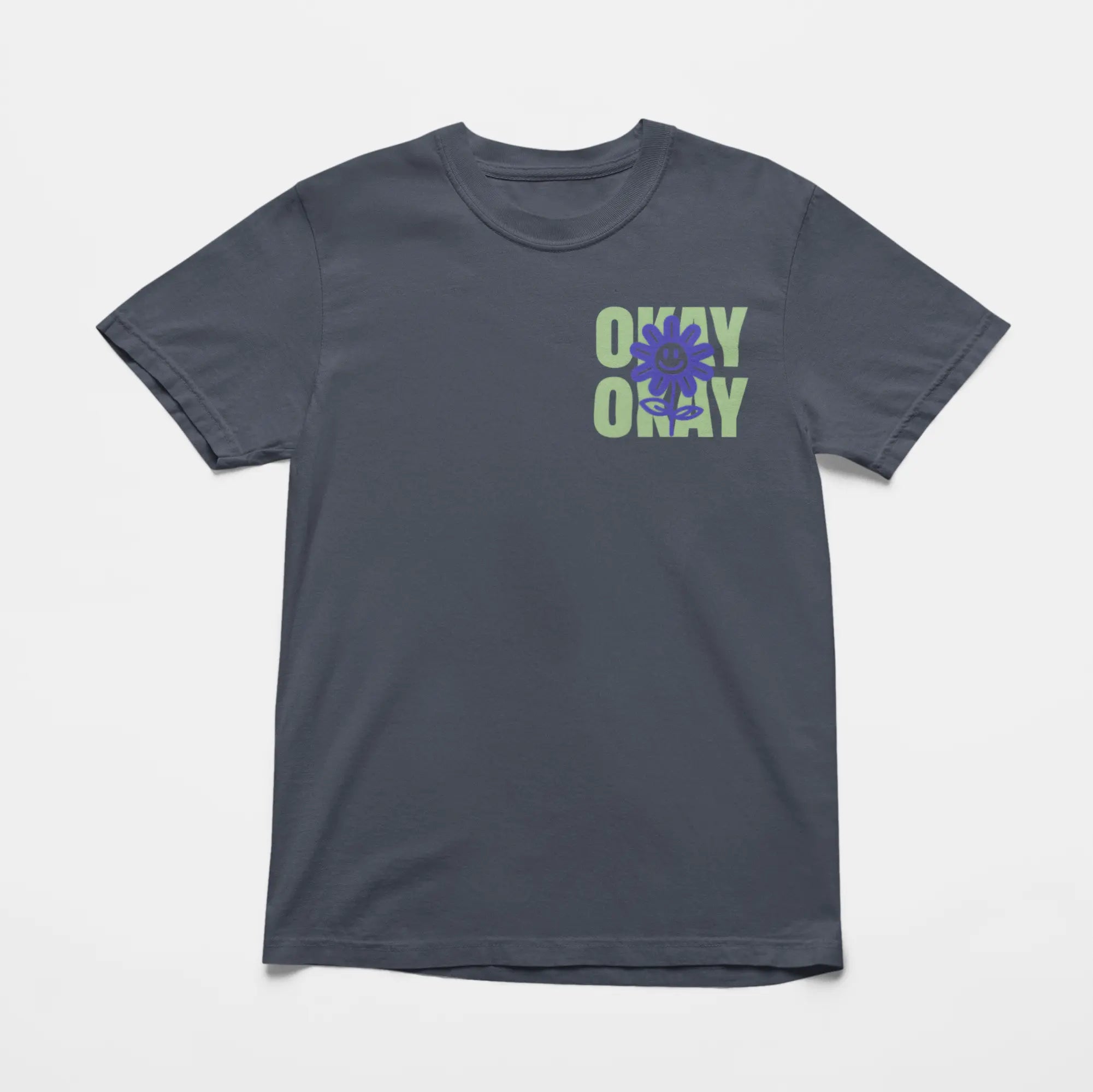 Clean background front view of "It Might Not Be Okay" sarcastic comfort tee with happy flower graphic