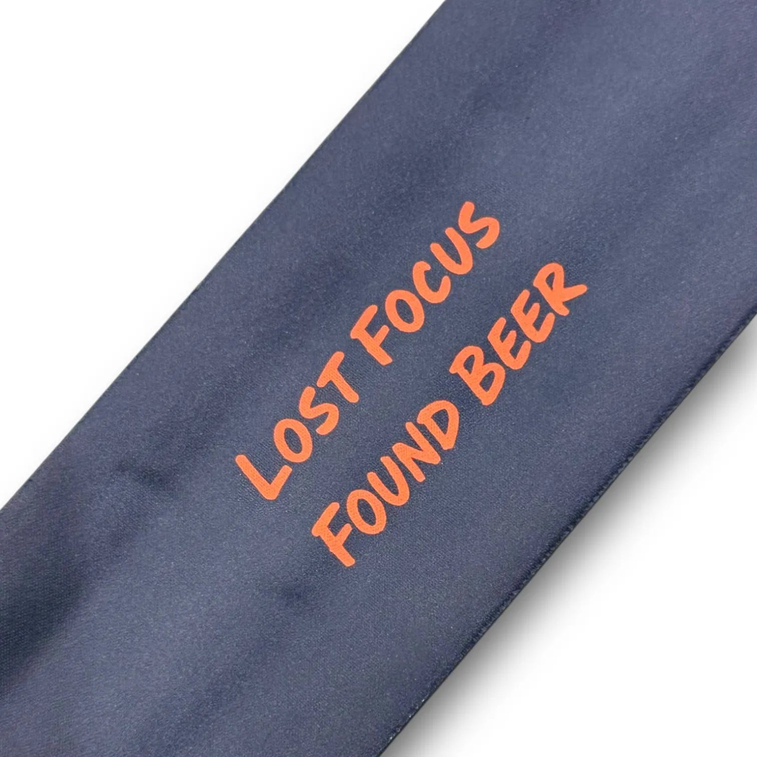 Funny ADHD Beer Accessory showing wrap function - Lost Focus Found Beer Koozie for forgetful drinkers