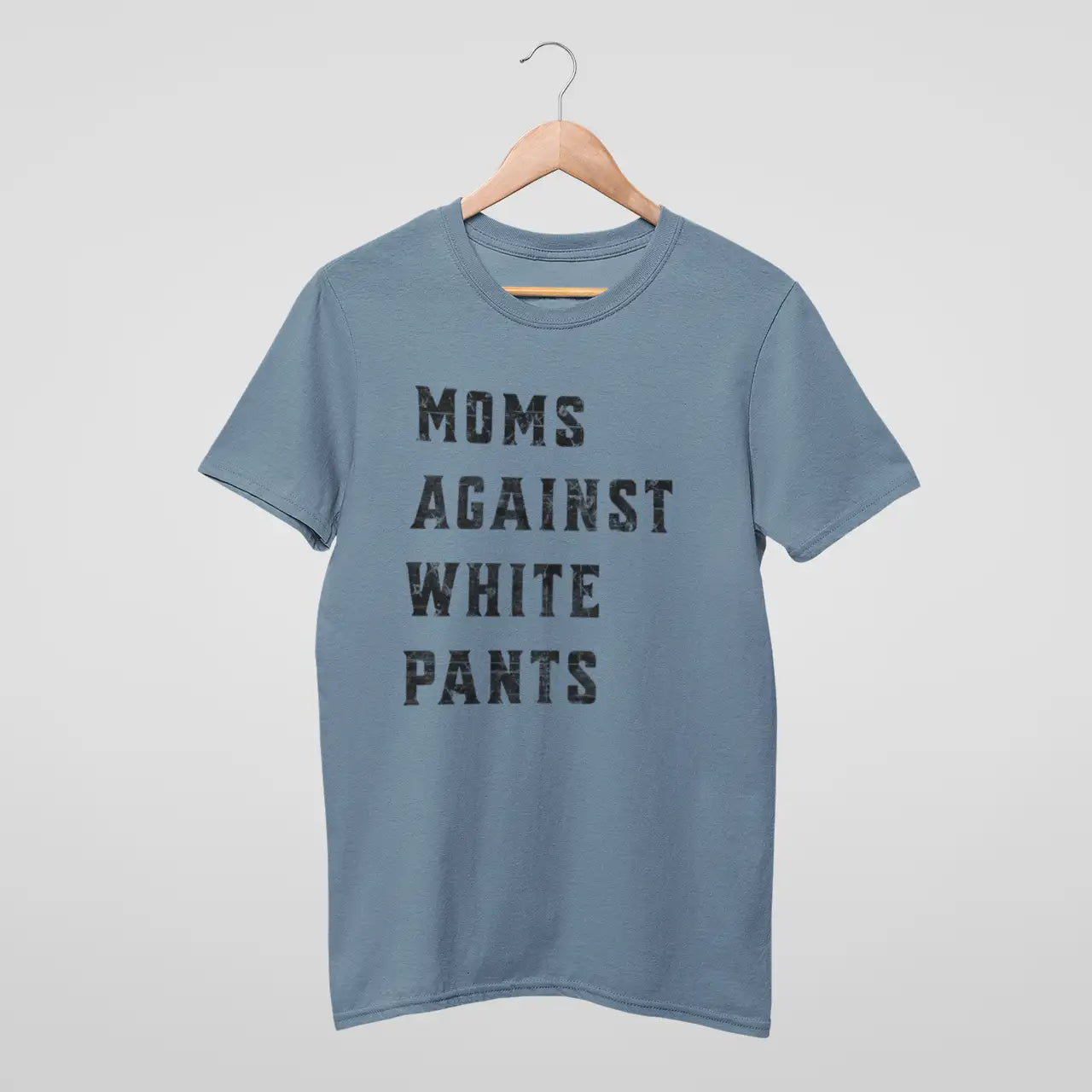 "Moms Against White Pants" blue jean Comfort Colors tee on hanger - sports mom apparel for sideline parents who've had enough