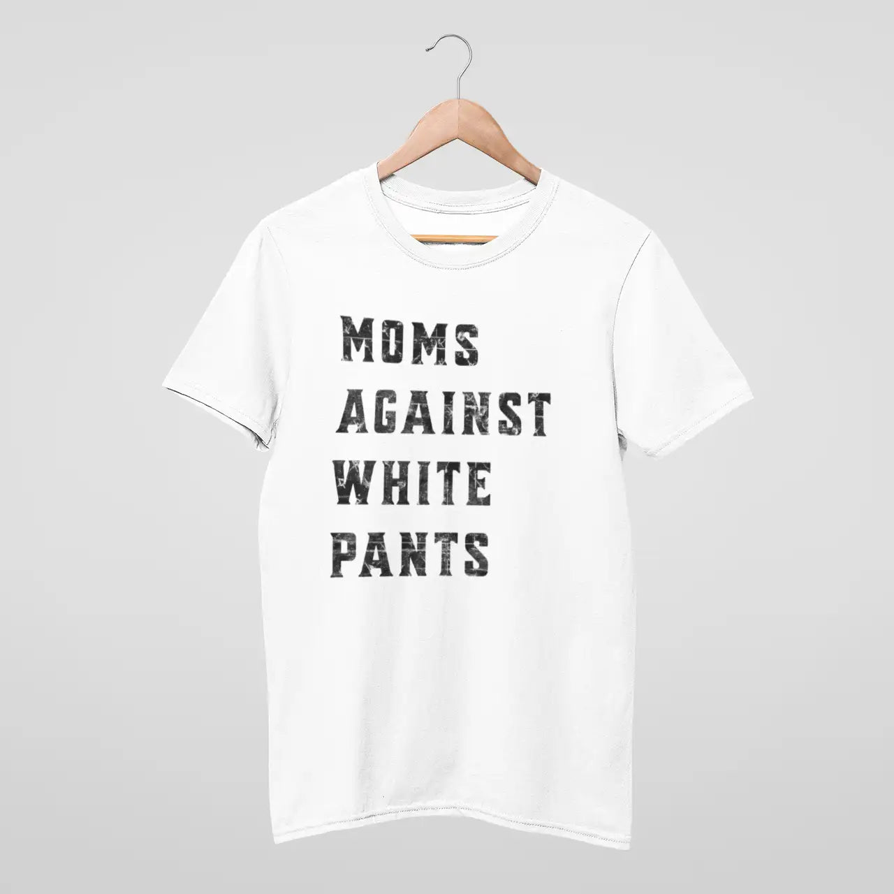 "Moms Against White Pants" white Comfort Colors tee on hanger - sports mom shirt for parents tired of stain battles