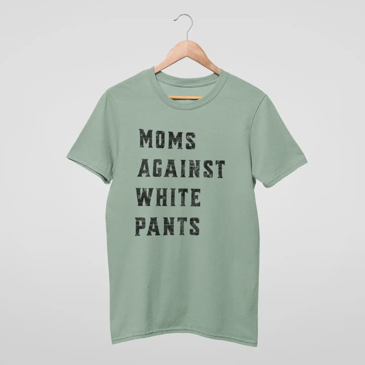 "Moms Against White Pants" chalky mint Comfort Colors tee on hanger - football mom shirt for parents sick of white uniform disasters