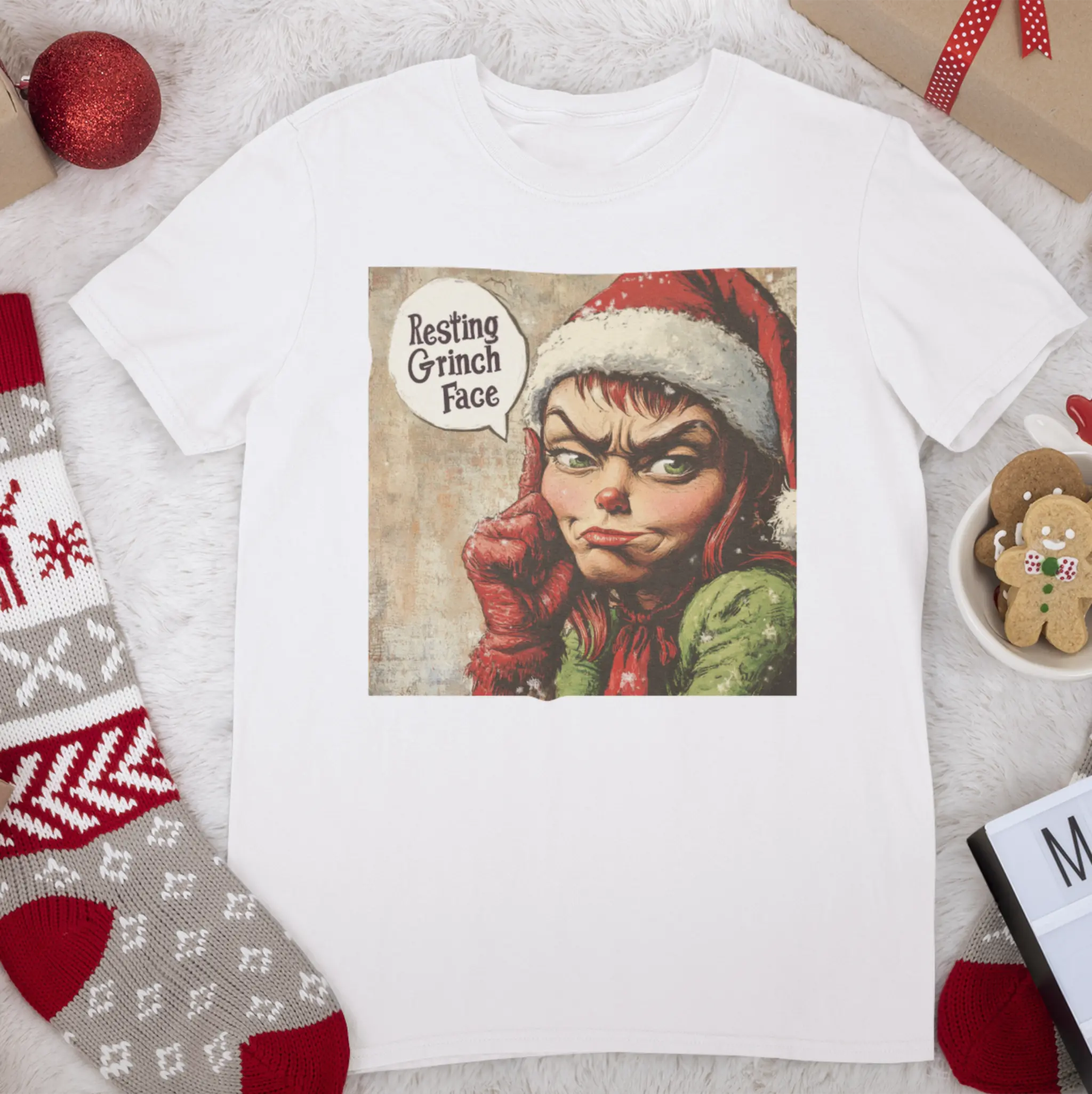 Flat lay of "Resting Grinch Face" t-shirt - funny Grinch Christmas tee for those with permanent holiday grumpiness