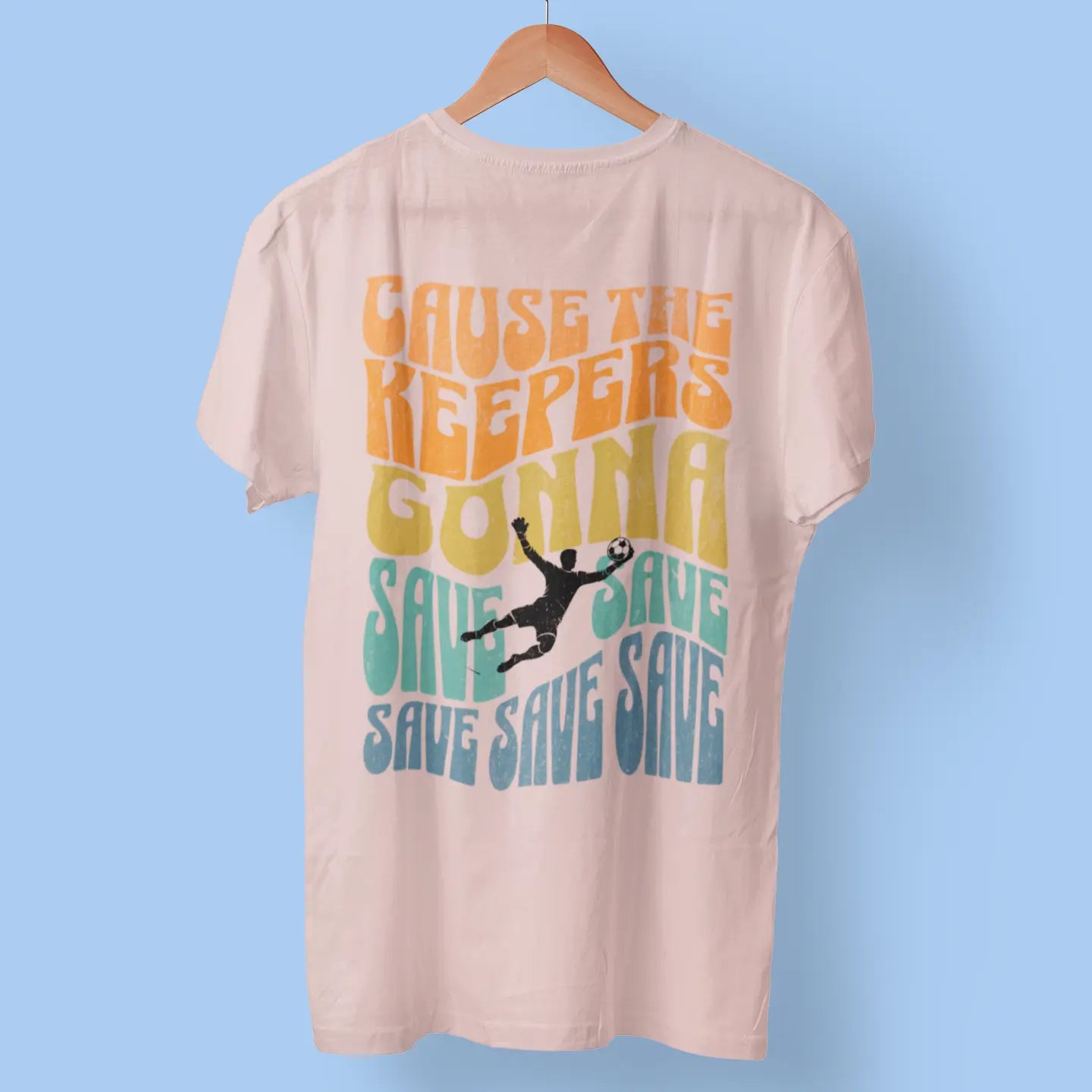 Back view of pink boys soccer goalkeeper t-shirt on hanger "Keepers Gonna Save" - goalie apparel perfect for confident shot-stopping goalkeepers