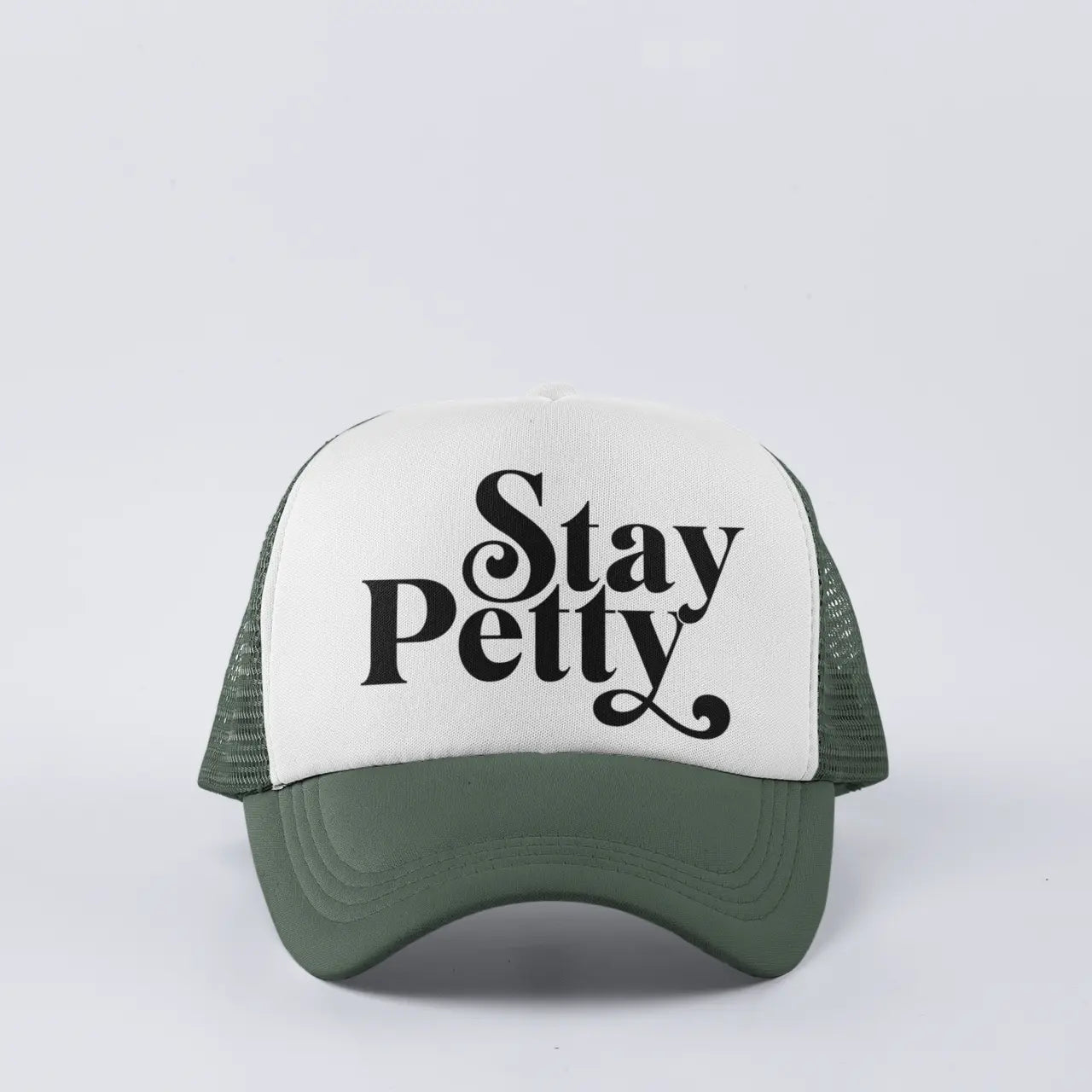 Angled view of "Stay Petty" trucker hat showing snapback adjustment - snarky mesh back cap for everyday pettiness