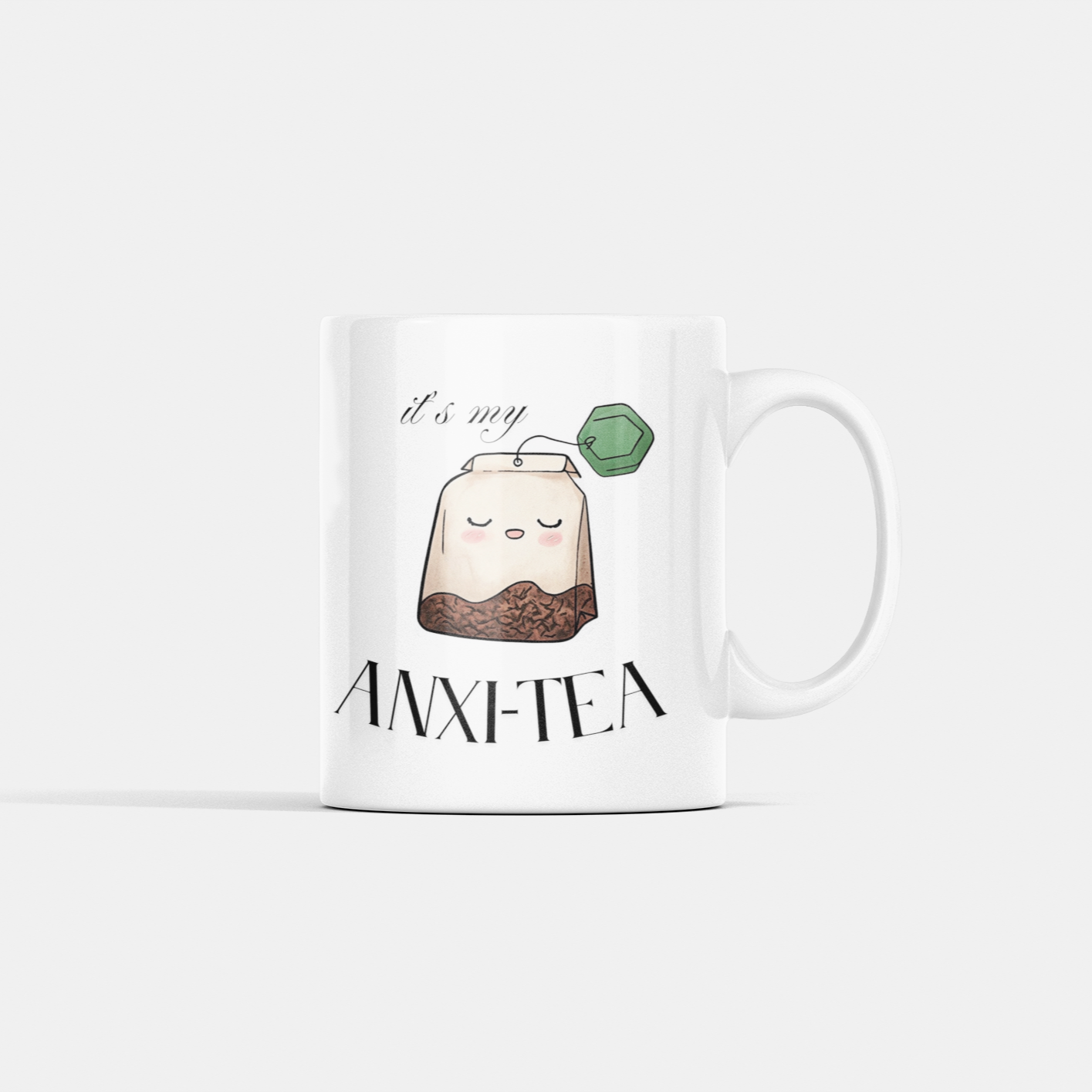 Funny 15 oz coffee mug with cartoon tea bag and “It’s My Anxie-Tea” mental health quote