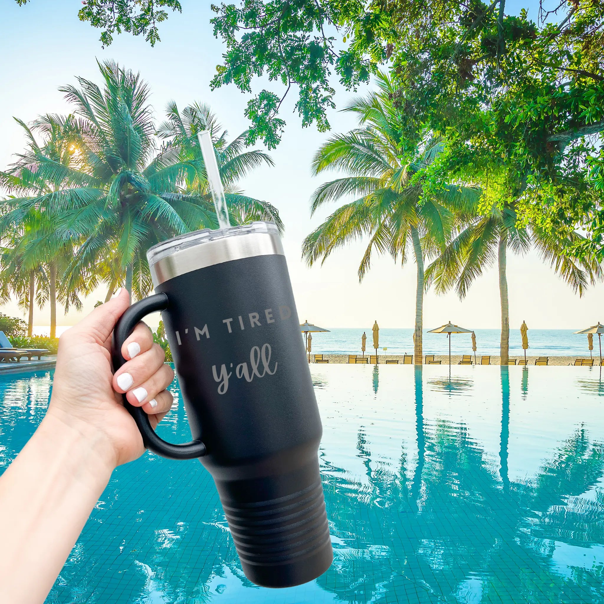 Flat lay of 40oz laser etched "I'm Tired Y'all" tumbler - stainless steel insulated drinkware for the chronically tired