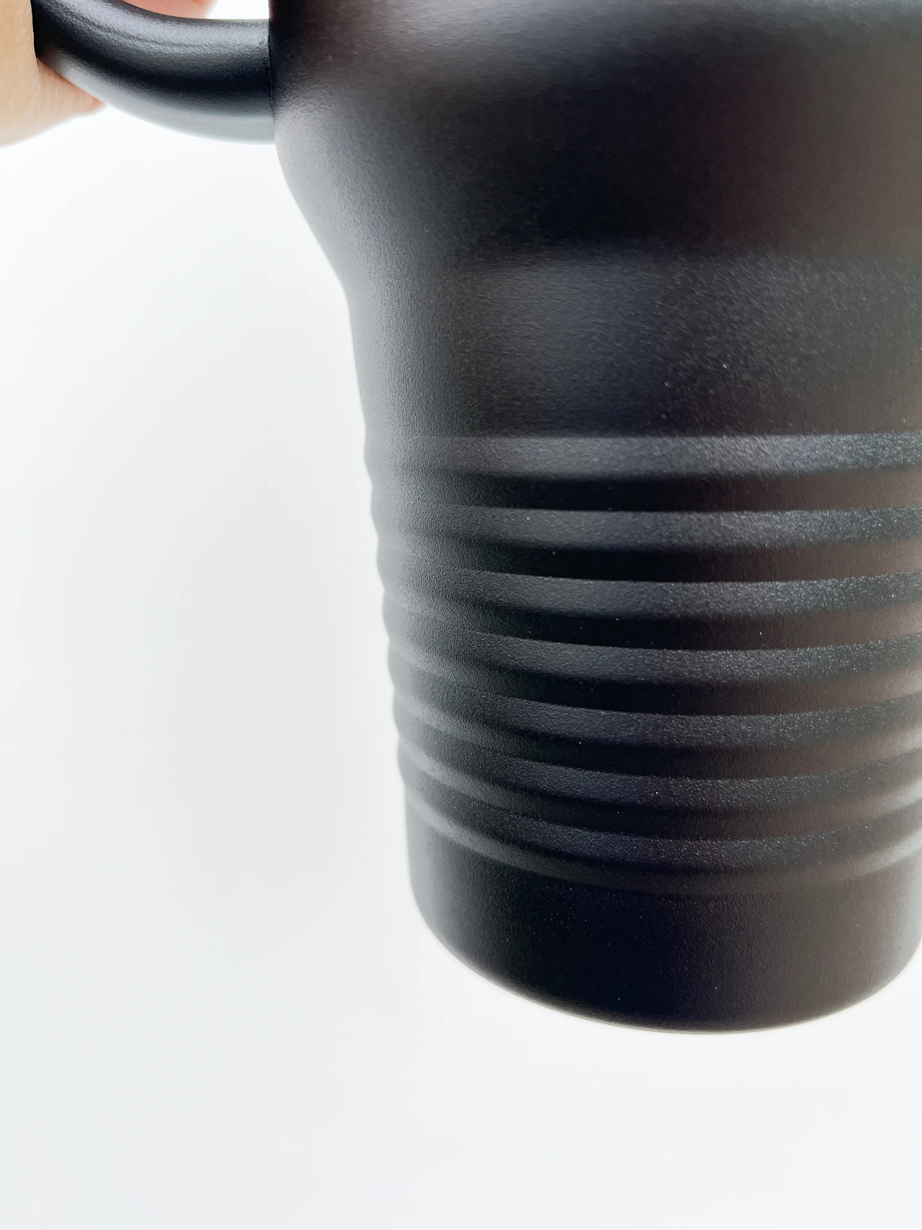 Flat lay of 40oz laser etched tumbler design - stainless steel insulated drinkware perfect for daily use