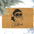 Christmas door mat with santa wearing sunglasses and Merry Christmas messaging. 