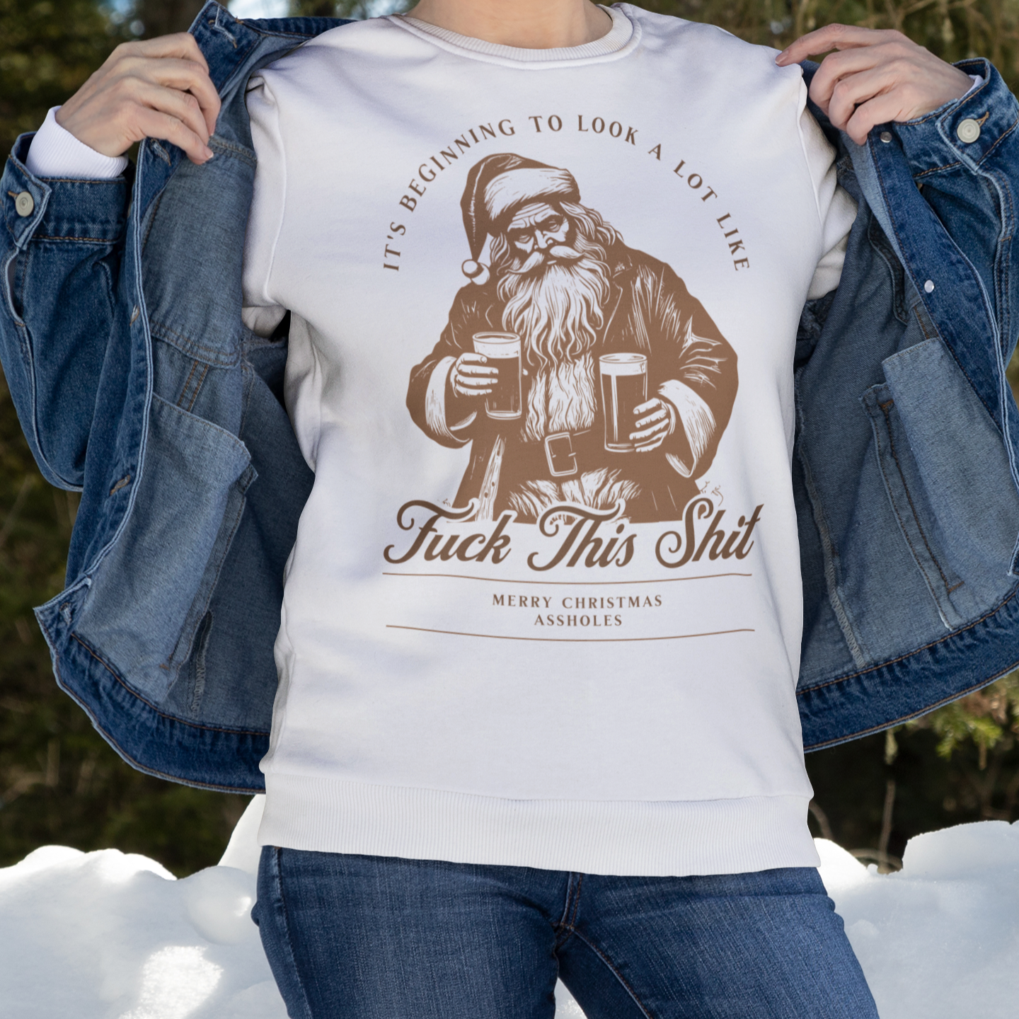 woman standing with Christmas crewneck sweatshirt with a cheeky Santa design and the phrase 'It's Beginning to Look a Lot Like F*** This Sh**,' perfect for humorous holiday style.