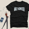 Lifestyle shot of man in "MILF HUNTER" t-shirt - funny inappropriate humor tee for adults who love edgy jokes