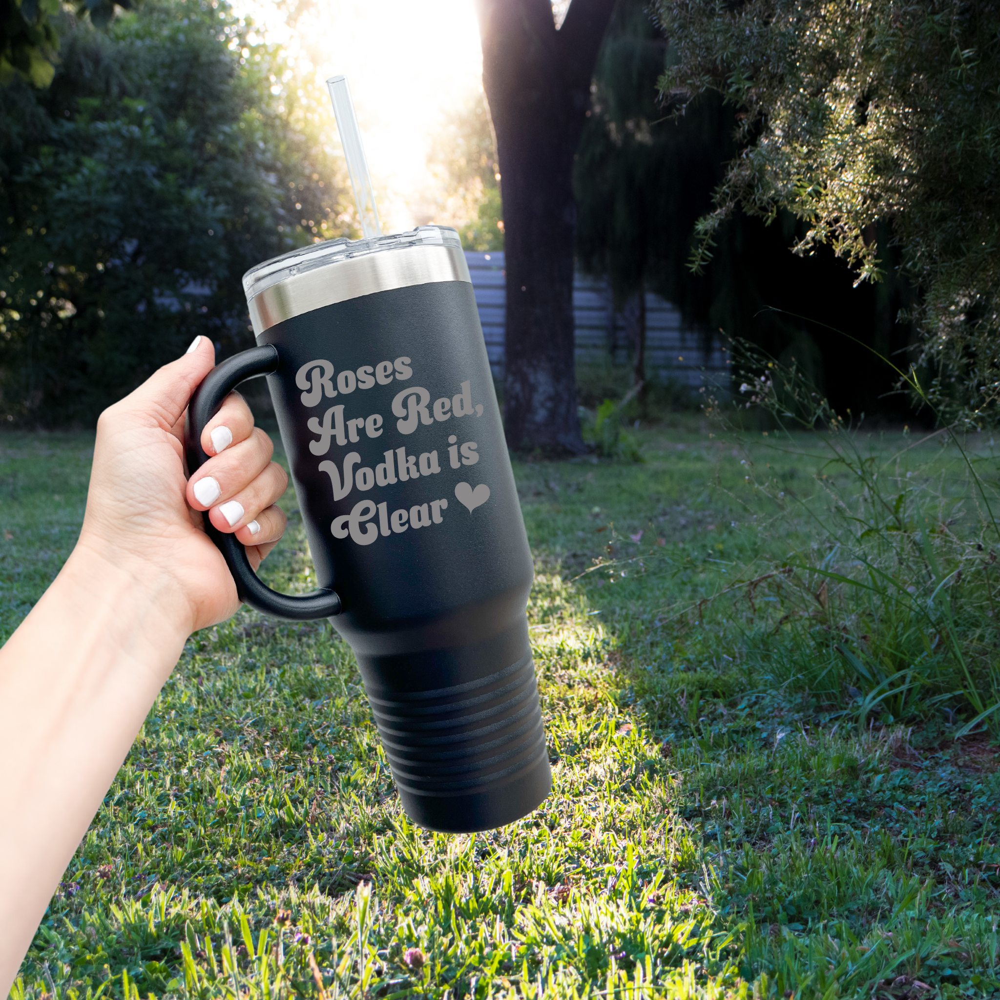 Stay hydrated (or not) with our 'Roses Are Red, Vodka Is Clear' 40 oz tumbler—perfect for any beverage mood!