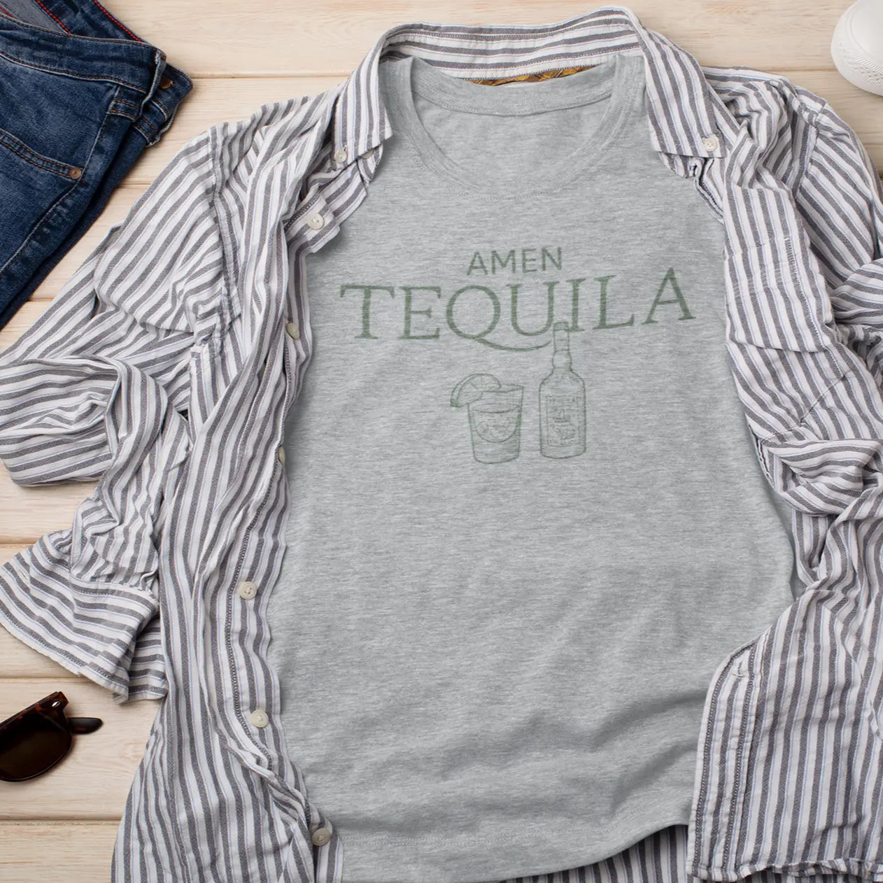 Round neck “Amen Tequila” shirt hanger mockup with tequila bottle and cocktail graphic
