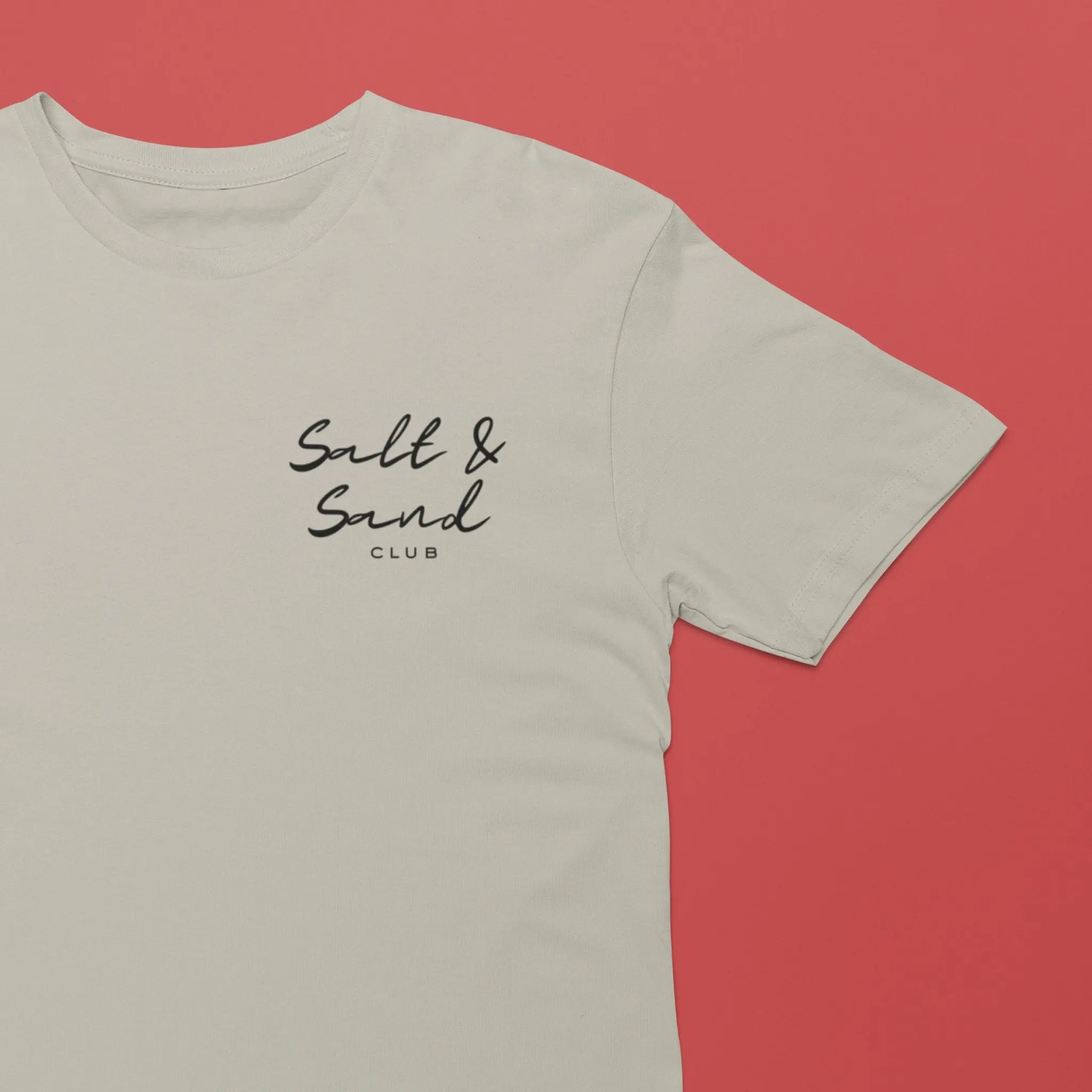 Summer beach vibes t-shirt with “Salt & Sand Club” palm tree sunset design, white coastal tee