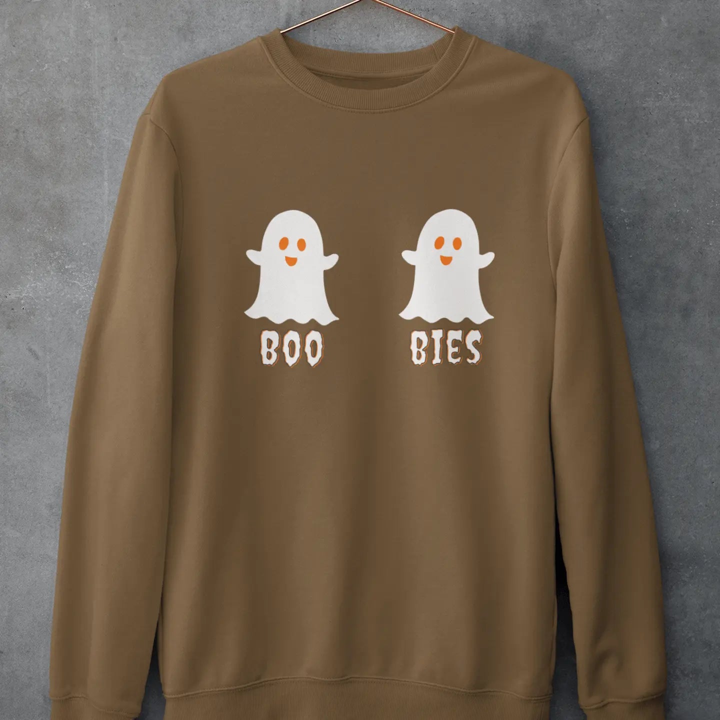 Flat lay of "Boo Bies" Halloween sweatshirt - cozy funny ghost design perfect for Halloween parties and fall festivities