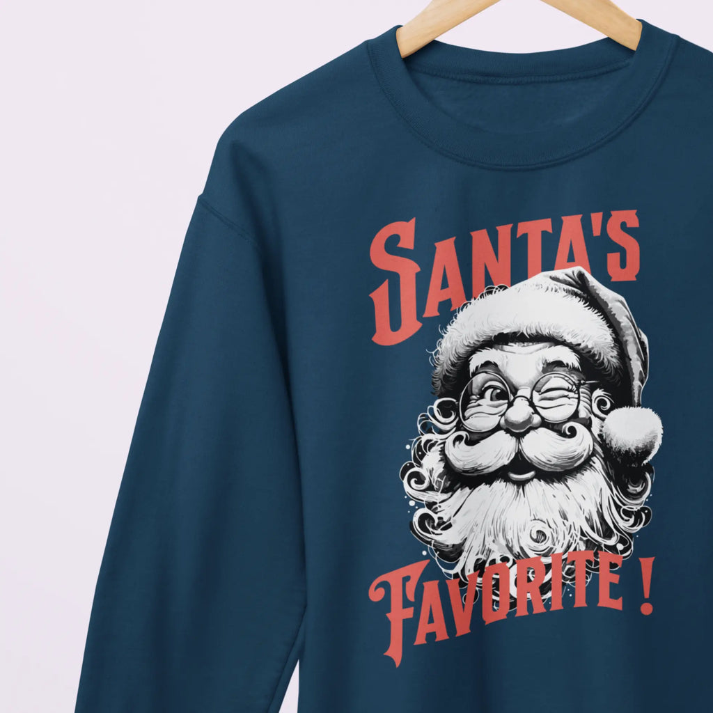 Funny holiday crewneck sweatshirt for women and men with Santa graphic and “Santa’s Favorite!” Christmas phrase