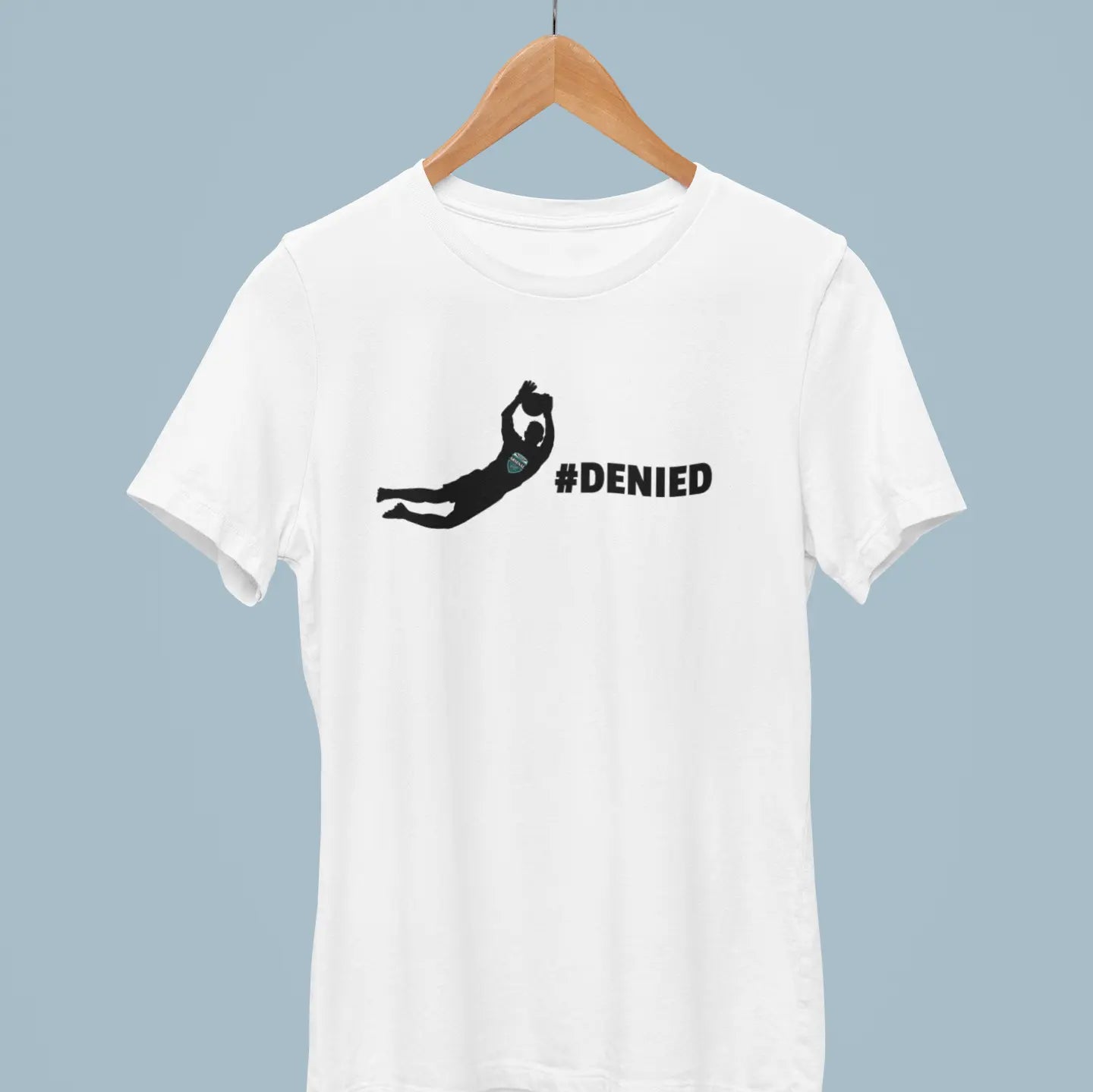 "#DENIED" soccer goalkeeper t-shirt in teal on hanger - goalie save shirt with diving keeper silhouette for shot-stopping goalies