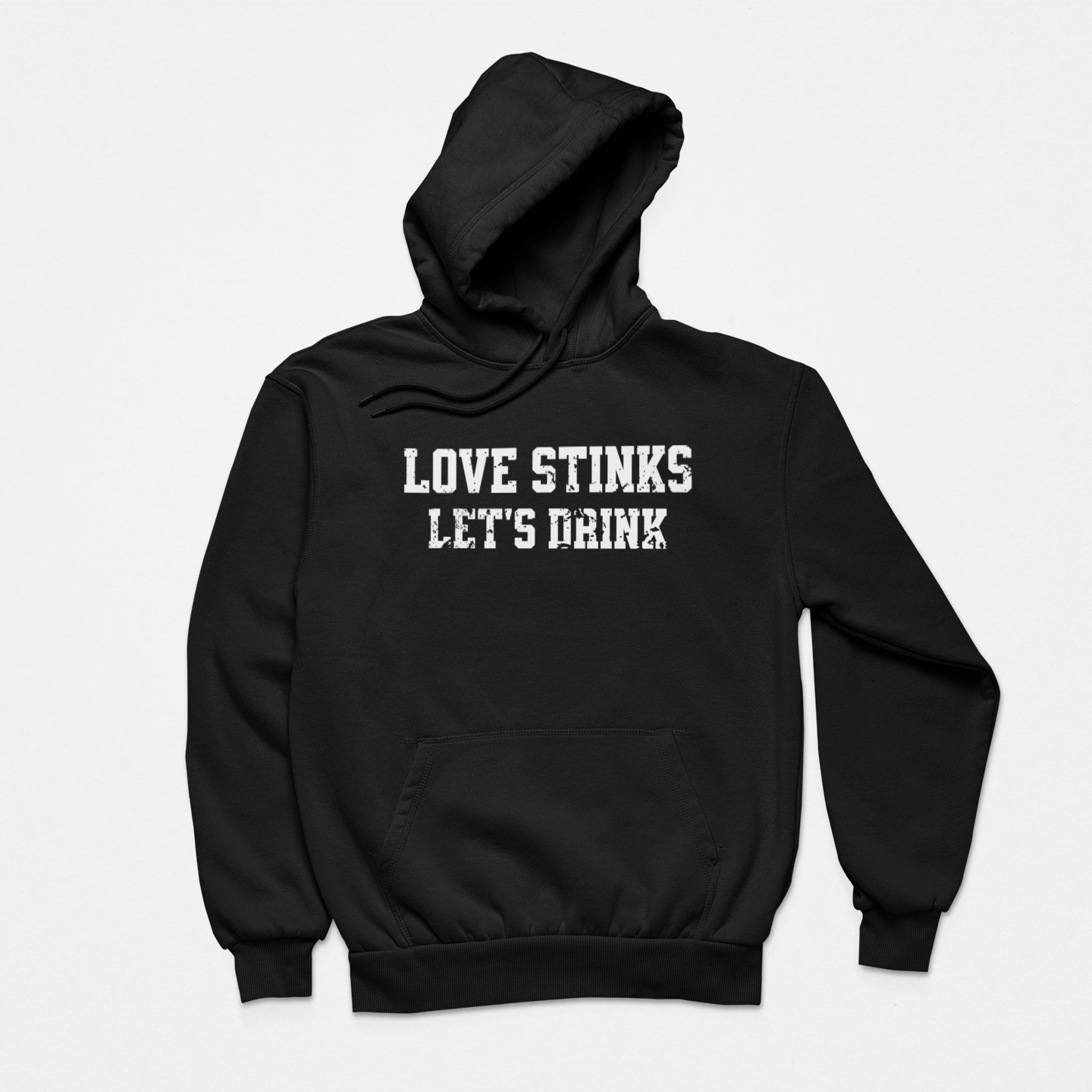 Black Flat lay Valentine's hoodie with the phrase 'Love Stinks, Let’s Drink,' perfect for cozy anti-Valentine's Day vibes.