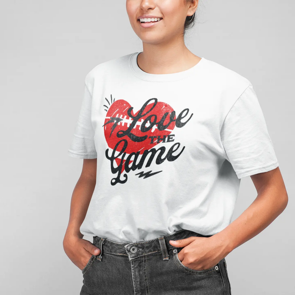 Football season t-shirt featuring “Love the Game” lettering and heart graphic, white unisex tee