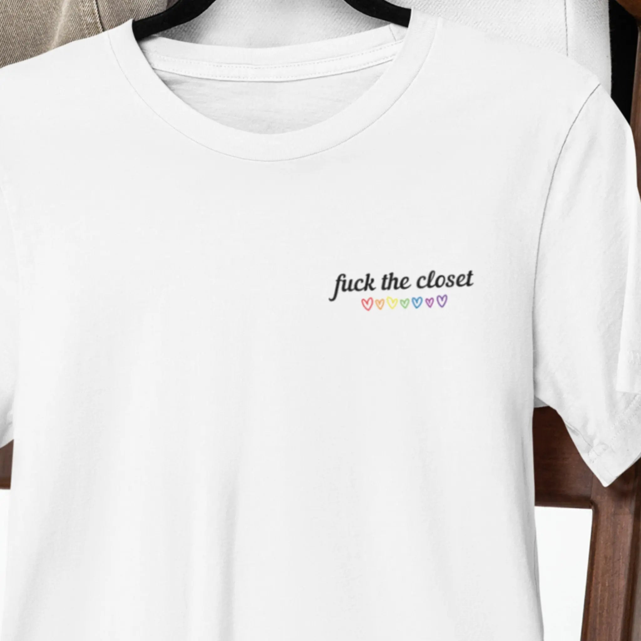 White unisex tee mockup featuring small “fuck the closet” text, pride ally shirt for men and women