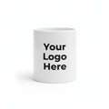 White ceramic coffee mug mockup held in hands with customizable logo area, personalized coffee mug gift