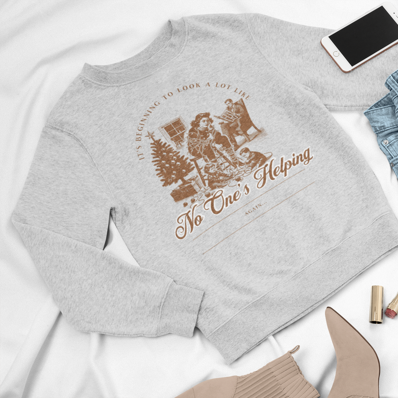 Christmas crewneck sweatshirt featuring a vintage design with the phrase 'It's Beginning to Look a Lot Like No One's Helping... Again,' perfect for holiday humor. Heather gray