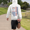 Man ready to run with customizable soccer team hoodies featuring team logo, player name, and number with color-matched flag and text, perfect for soccer fans and players