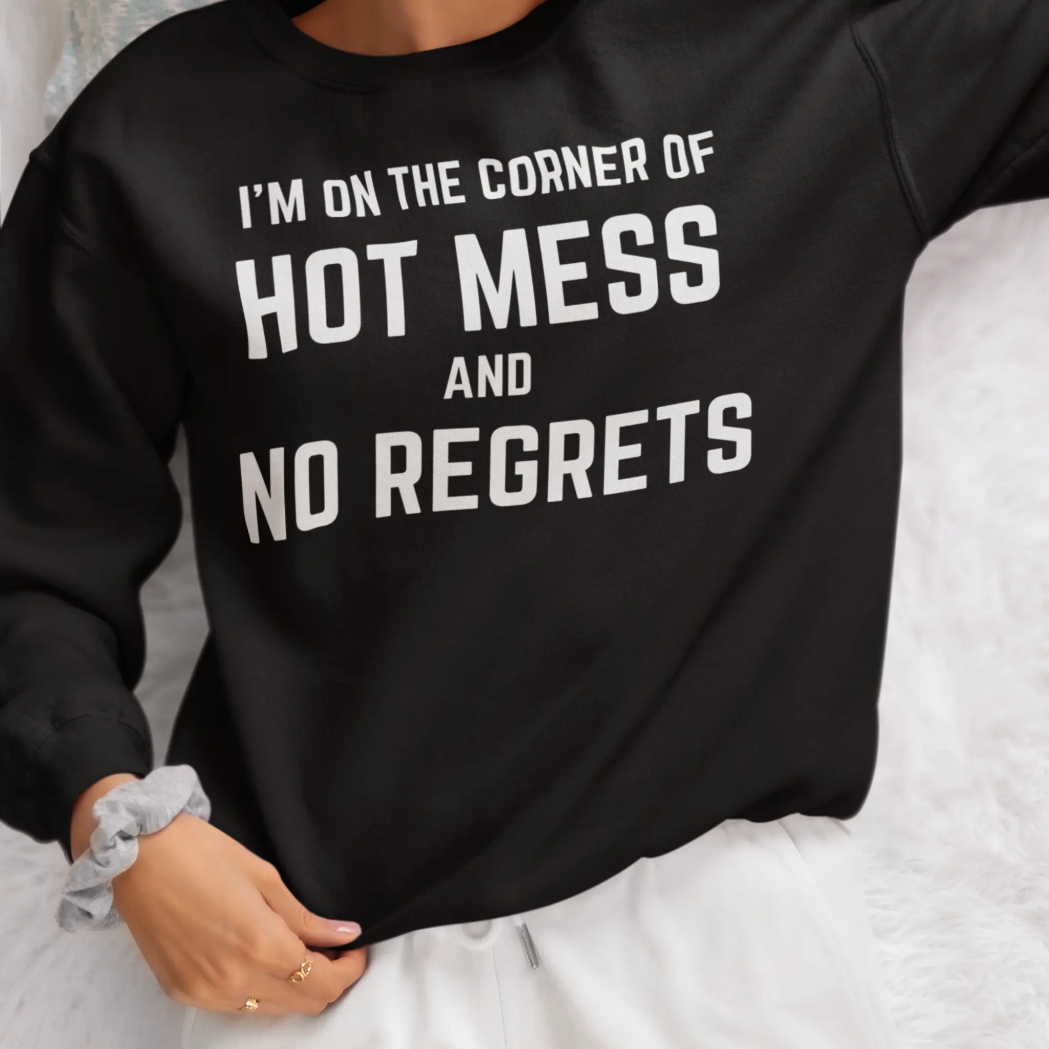 Woman wearing black "I'm On The Corner Of Hot Mess And No Regrets" sweatshirt - funny sarcastic humor sweater for unapologetic hot mess lifestyle