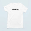 Flat lay "I'm Not Not Into It" Bella Canvas shirt - witty apparel for people who embrace ambivalence with style