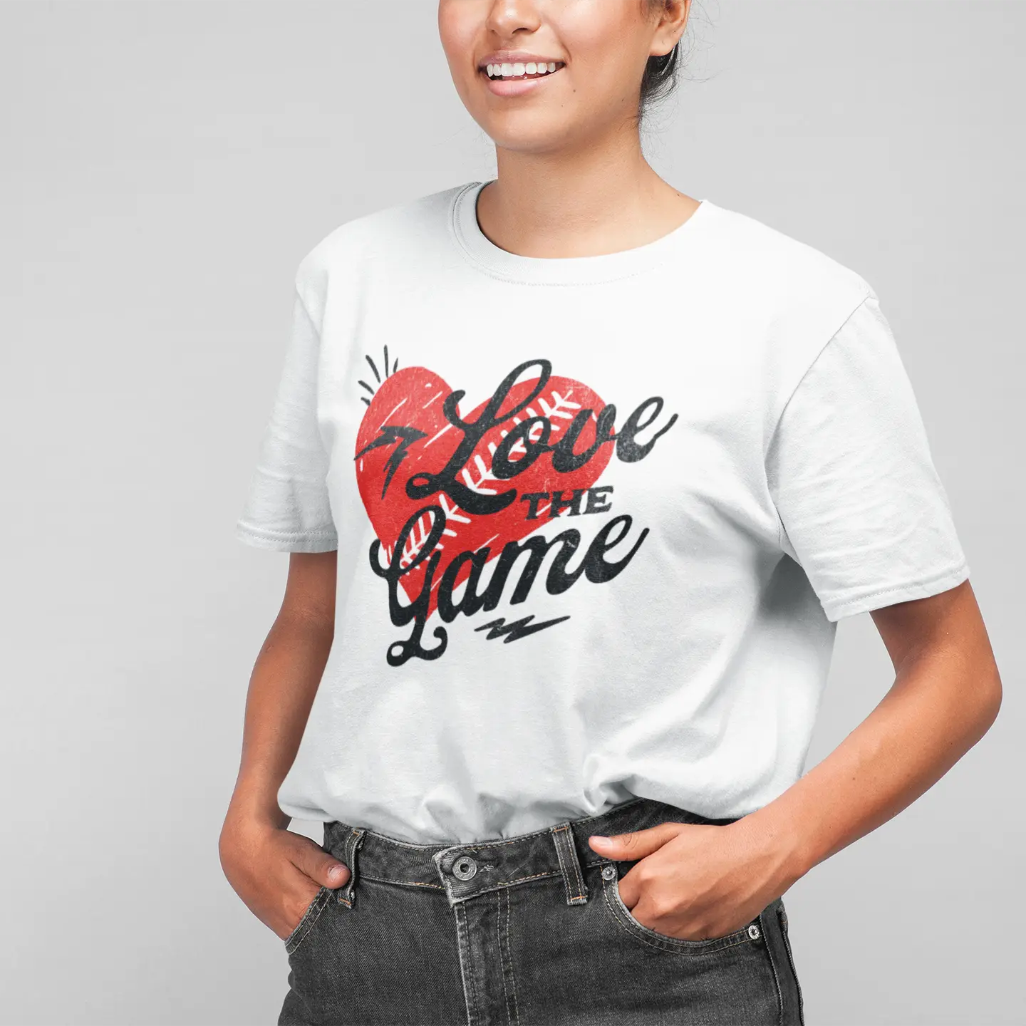 White unisex tee with red heart graphic and “Love the Game” lettering, sports lover shirt