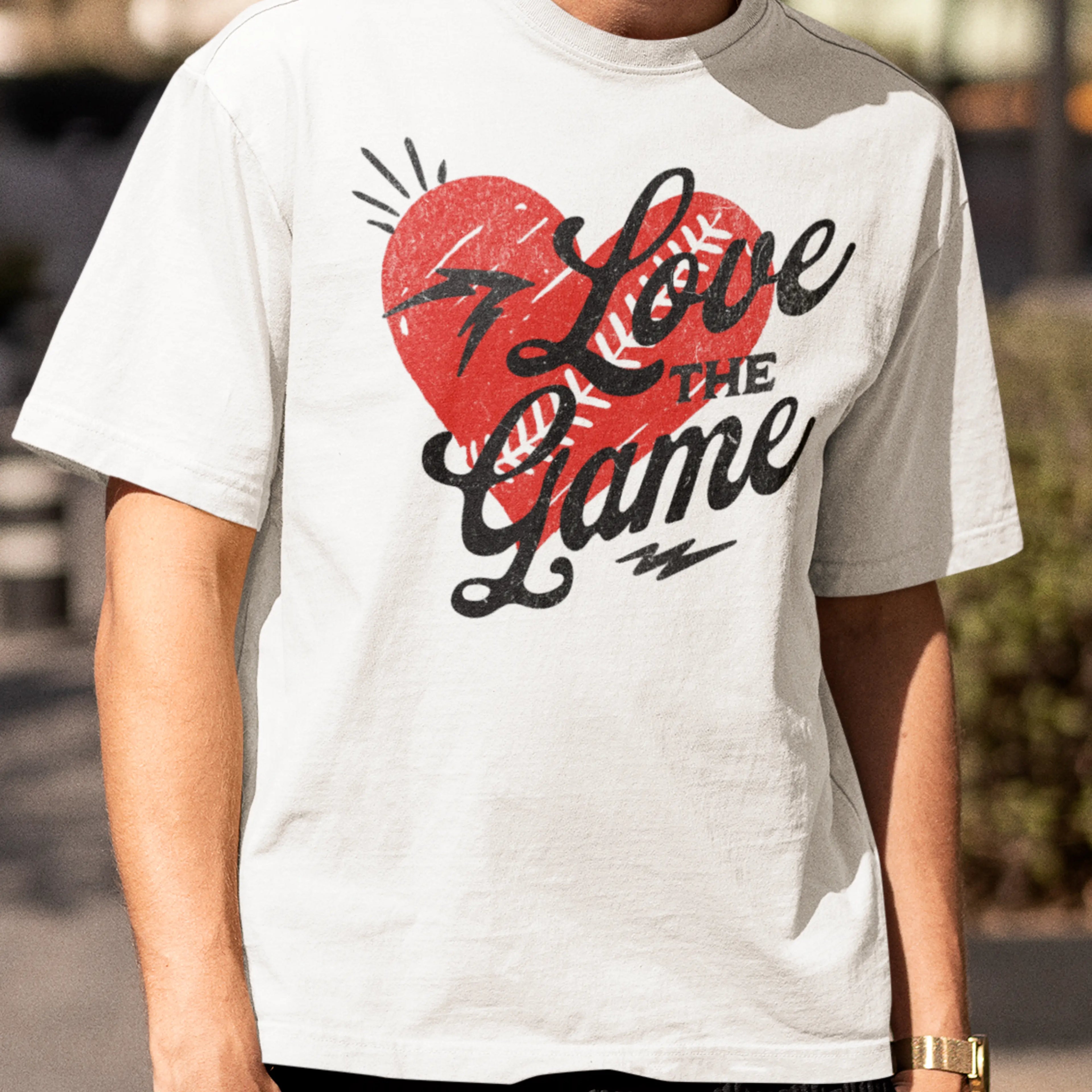 White t-shirt with red heart and “Love the Game” text, football fan graphic tee for game day