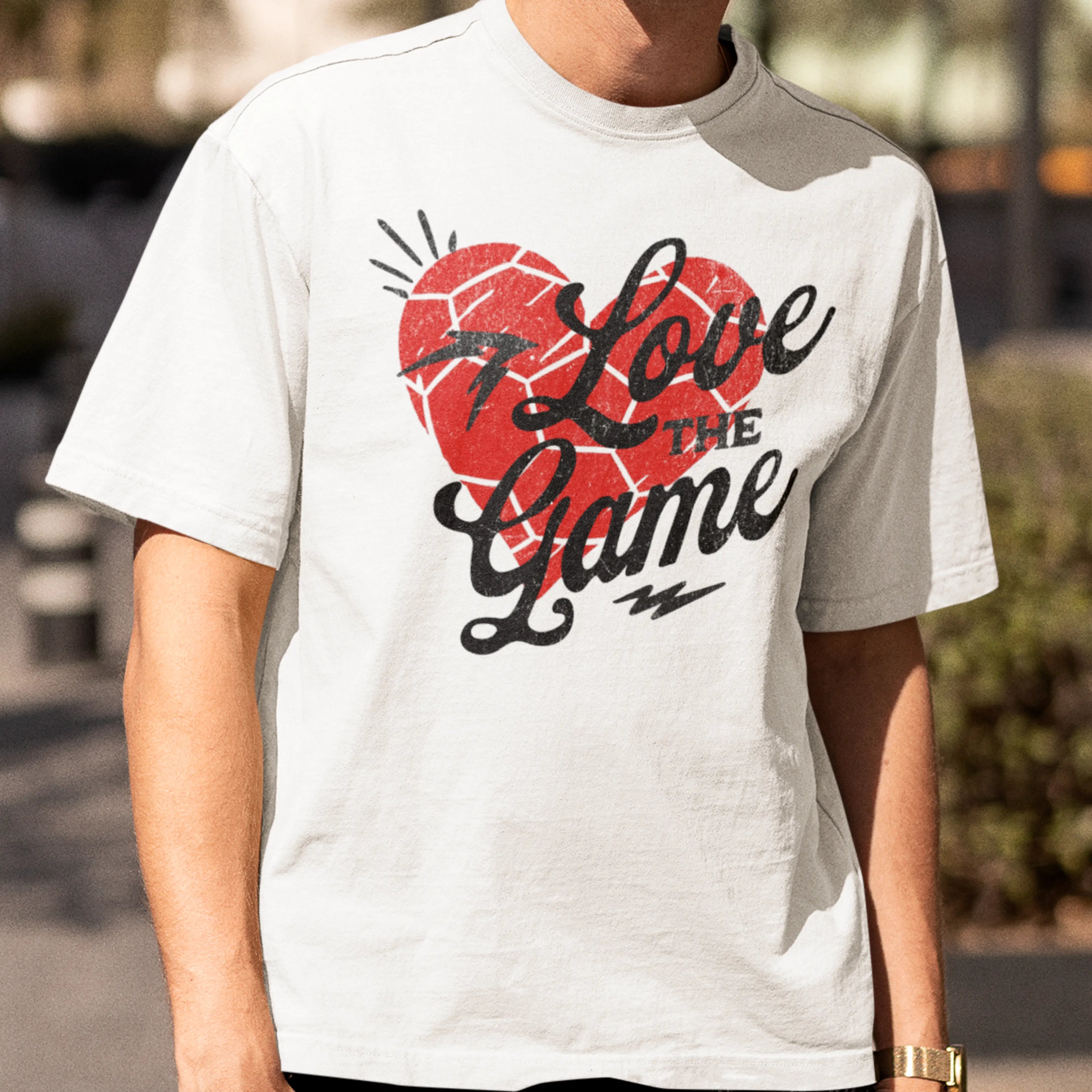 “Love the Game” soccer shirt featuring heart and soccer design, unisex graphic tee for soccer lovers