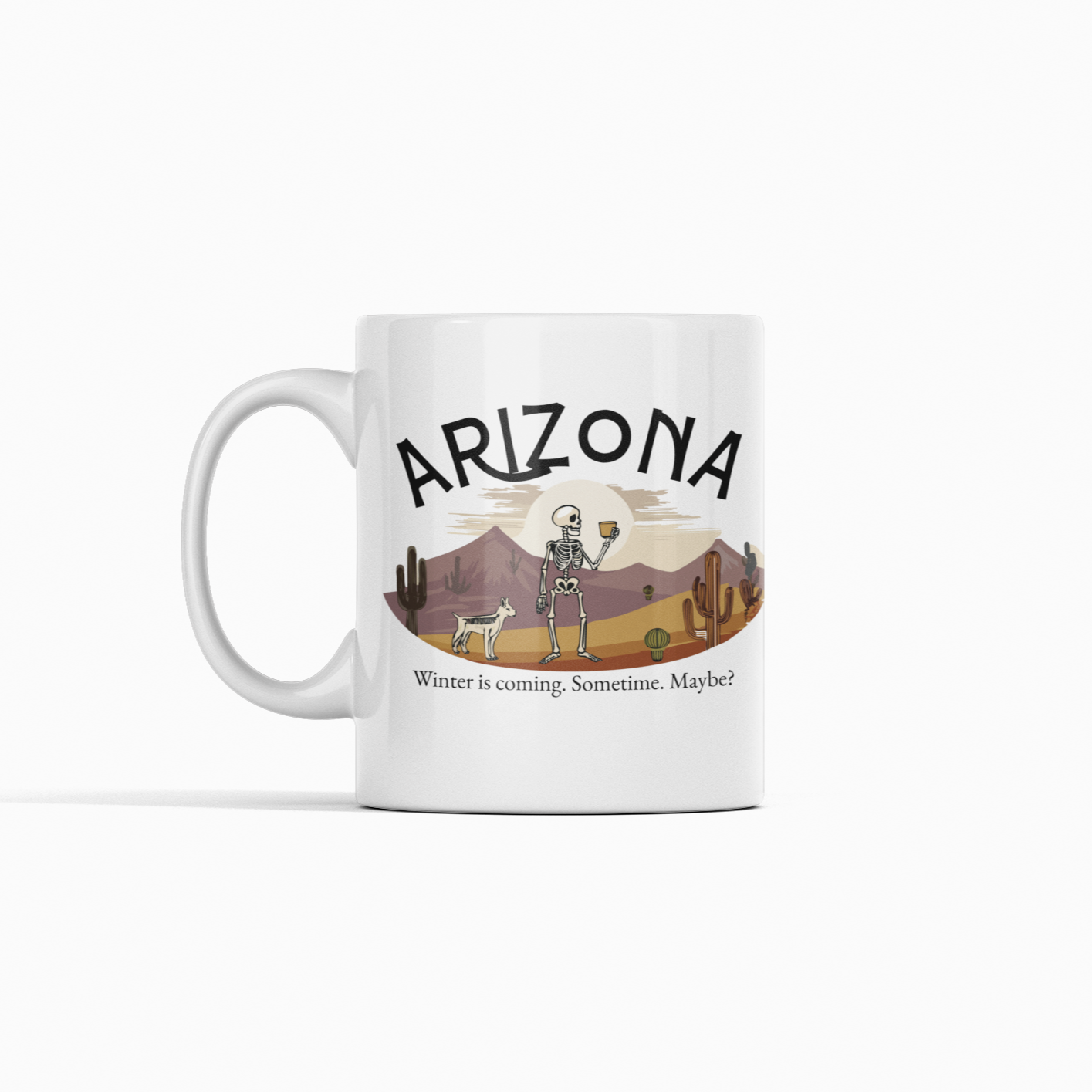 White 'Arizona - Winter is Coming. Sometime. Maybe.' ceramic mug with a desert-themed design, available in 11 oz and 15 oz sizes."