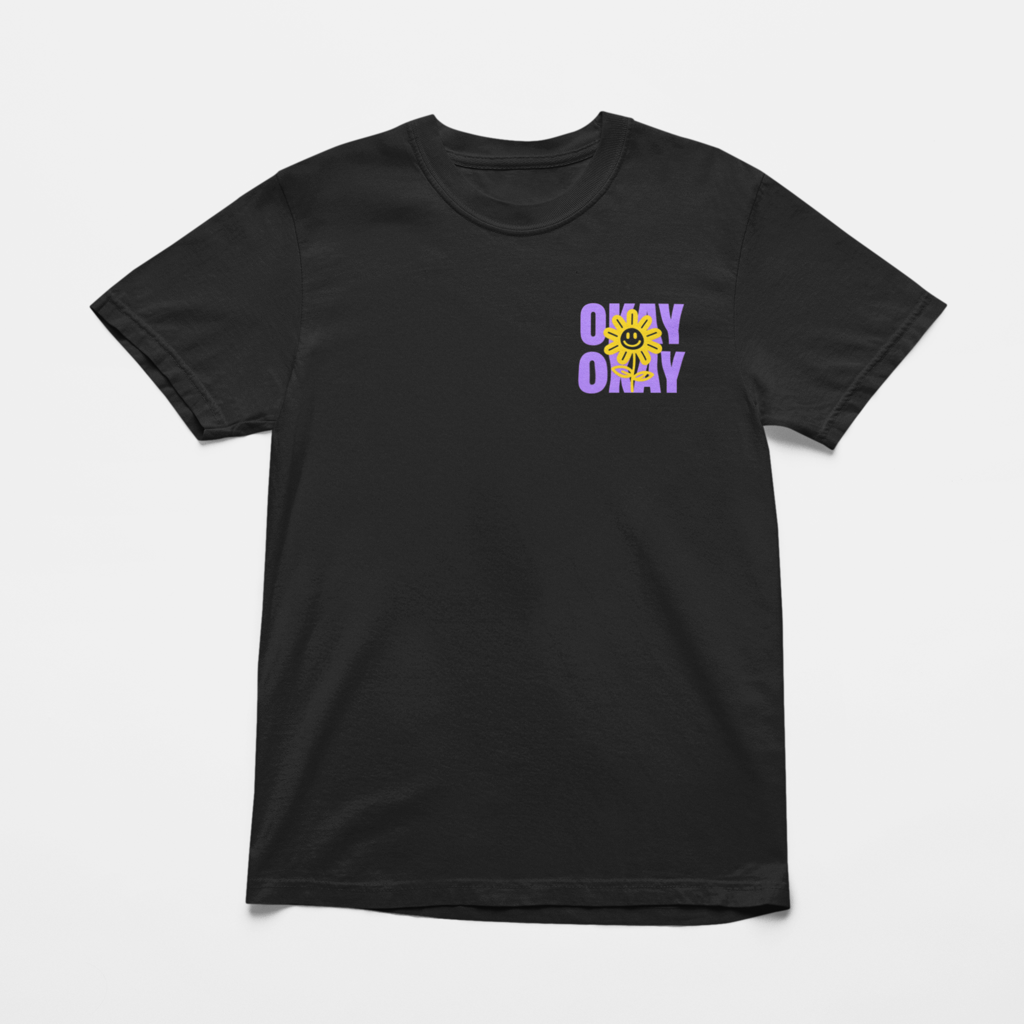 Oversized black front  tee with "It’s Gonna Be OK" printed in bold purple text on the back, styled for casual and confident comfort.