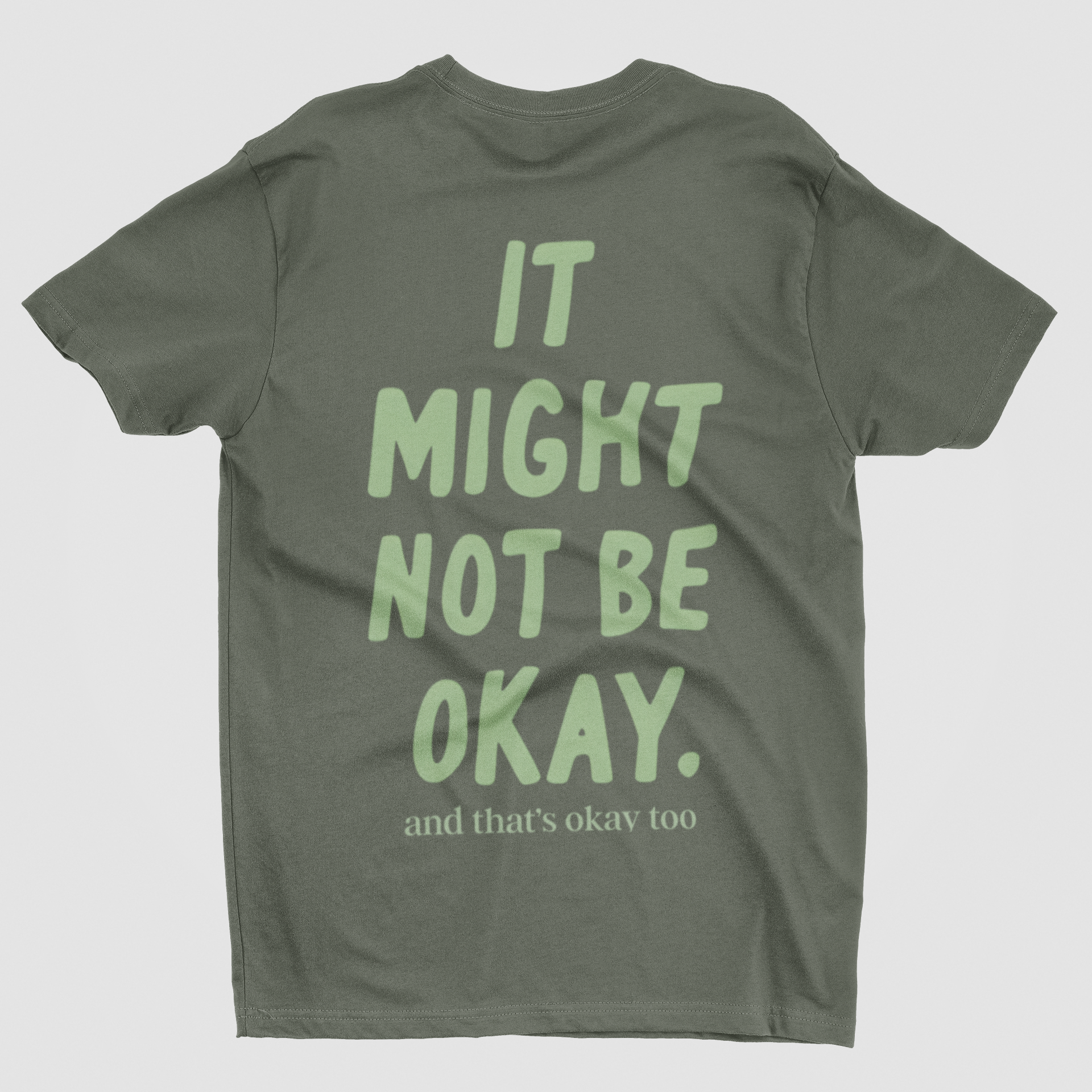 Sage back Comfort Colors t-shirt with "It Might Not Be Okay and That's Okay Too" message from After Five Designs
