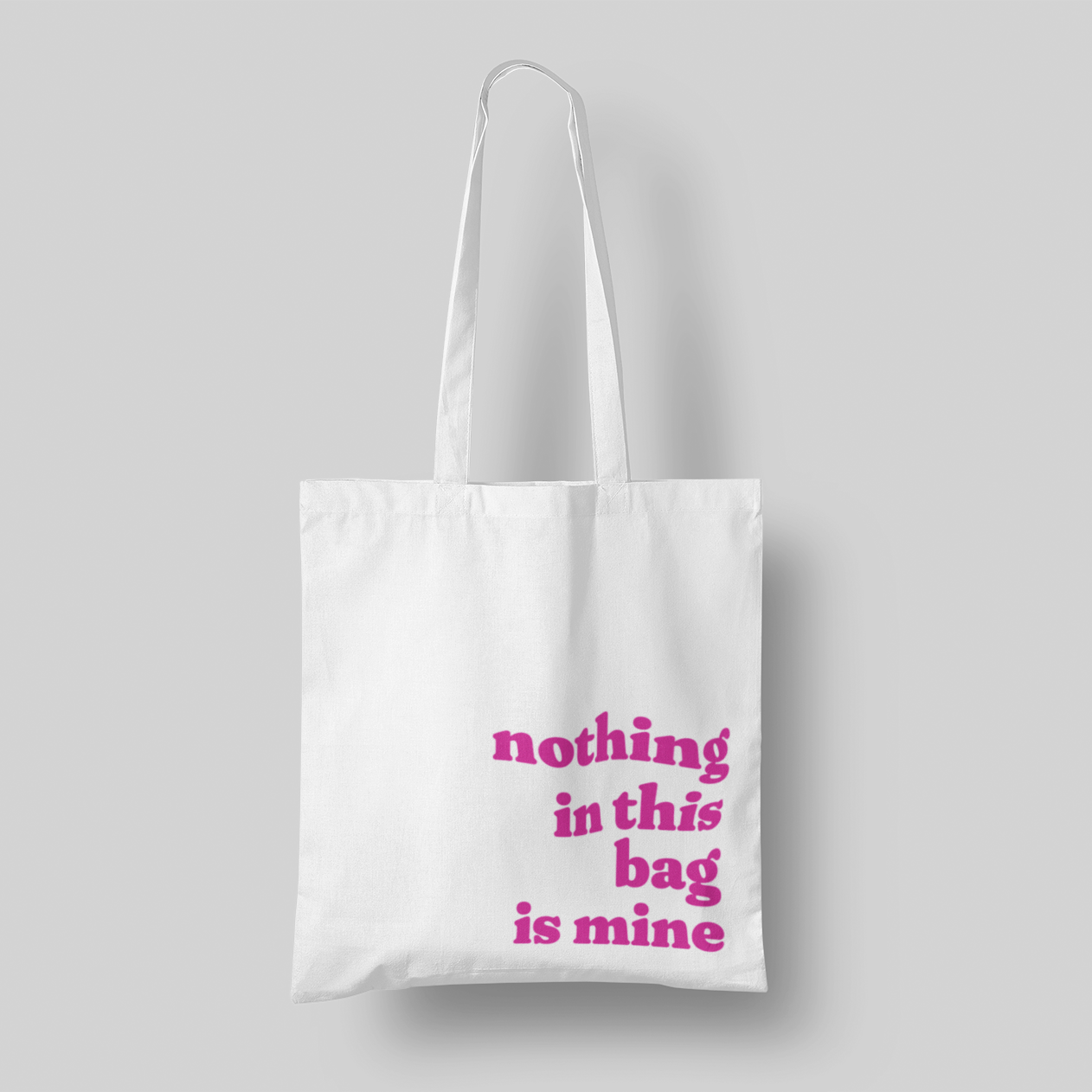pink text 'Nothing in This Bag is Mine' cotton canvas tote, 15x16 inches, with multi-color text, perfect for hauling everyone else’s stuff