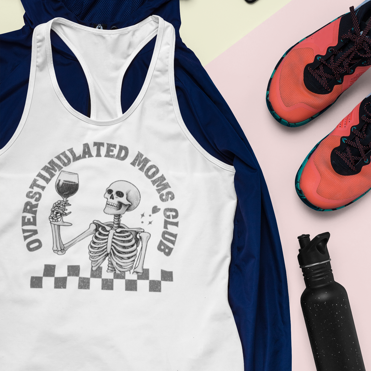White Racerback tank top with “Overstimulated Moms Club” and skeleton holding wine design