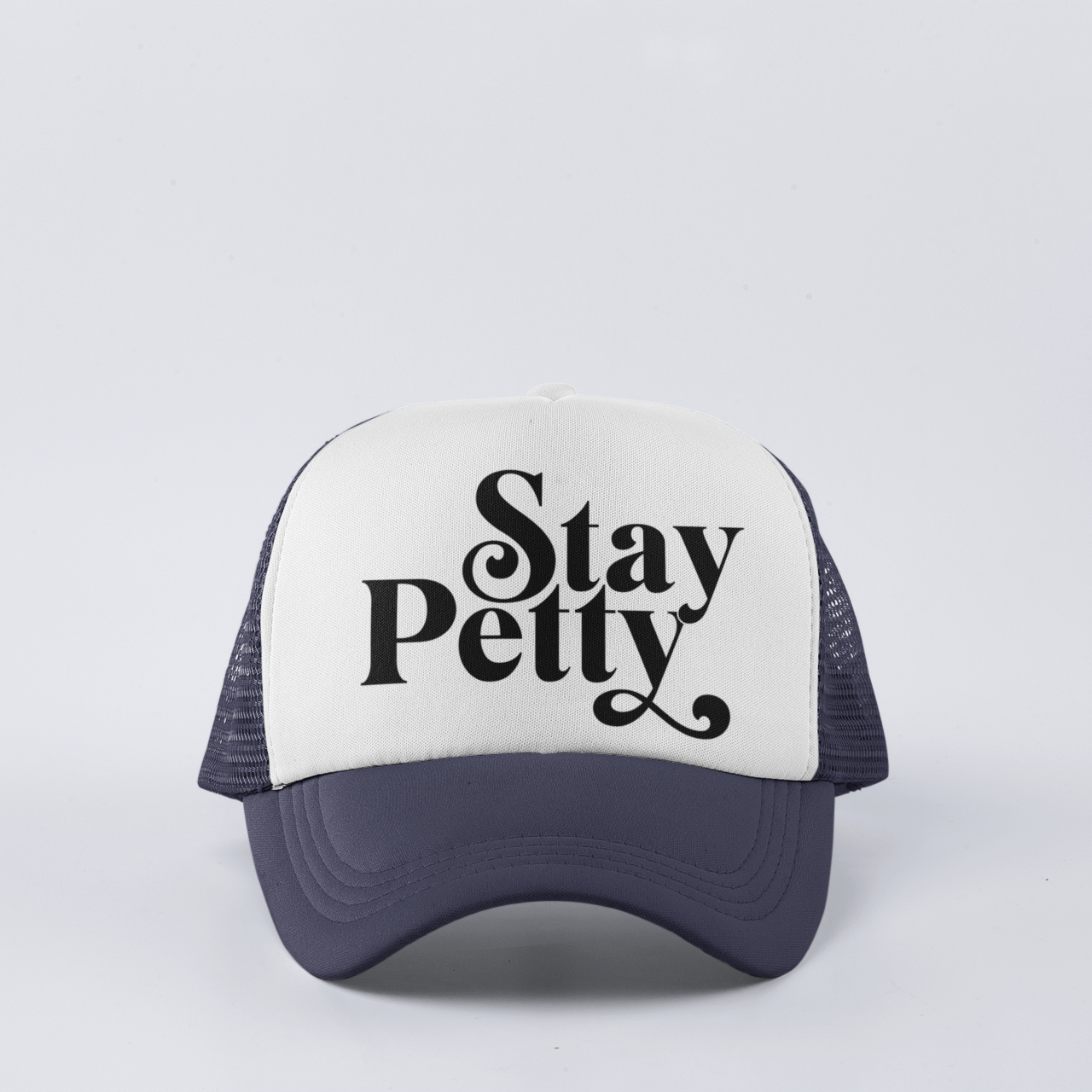 Navy funny trucker hat with ‘Stay Petty’ design, featuring a snapback closure and mesh back for comfort.