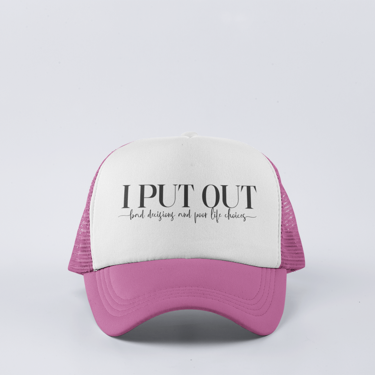 Pink Funny trucker hat with ‘I Put Out’ phrase, featuring mesh back and snapback closure.