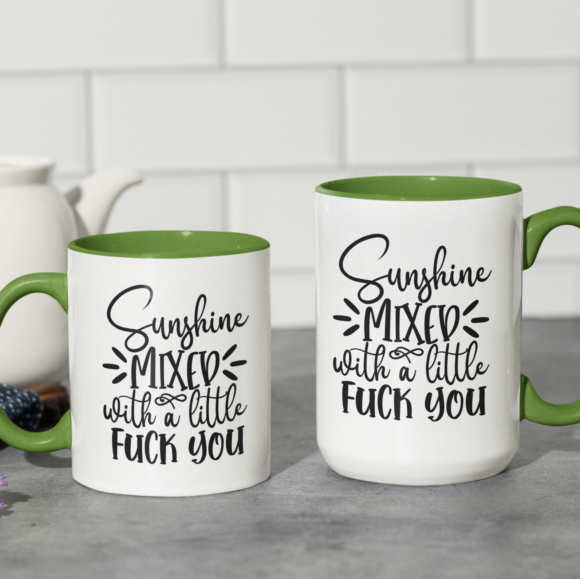 Green 'Sunshine Mixed with a Little F*** You' ceramic coffee mug, available in 11 oz and 15 oz sizes with bold graphic and blue handle