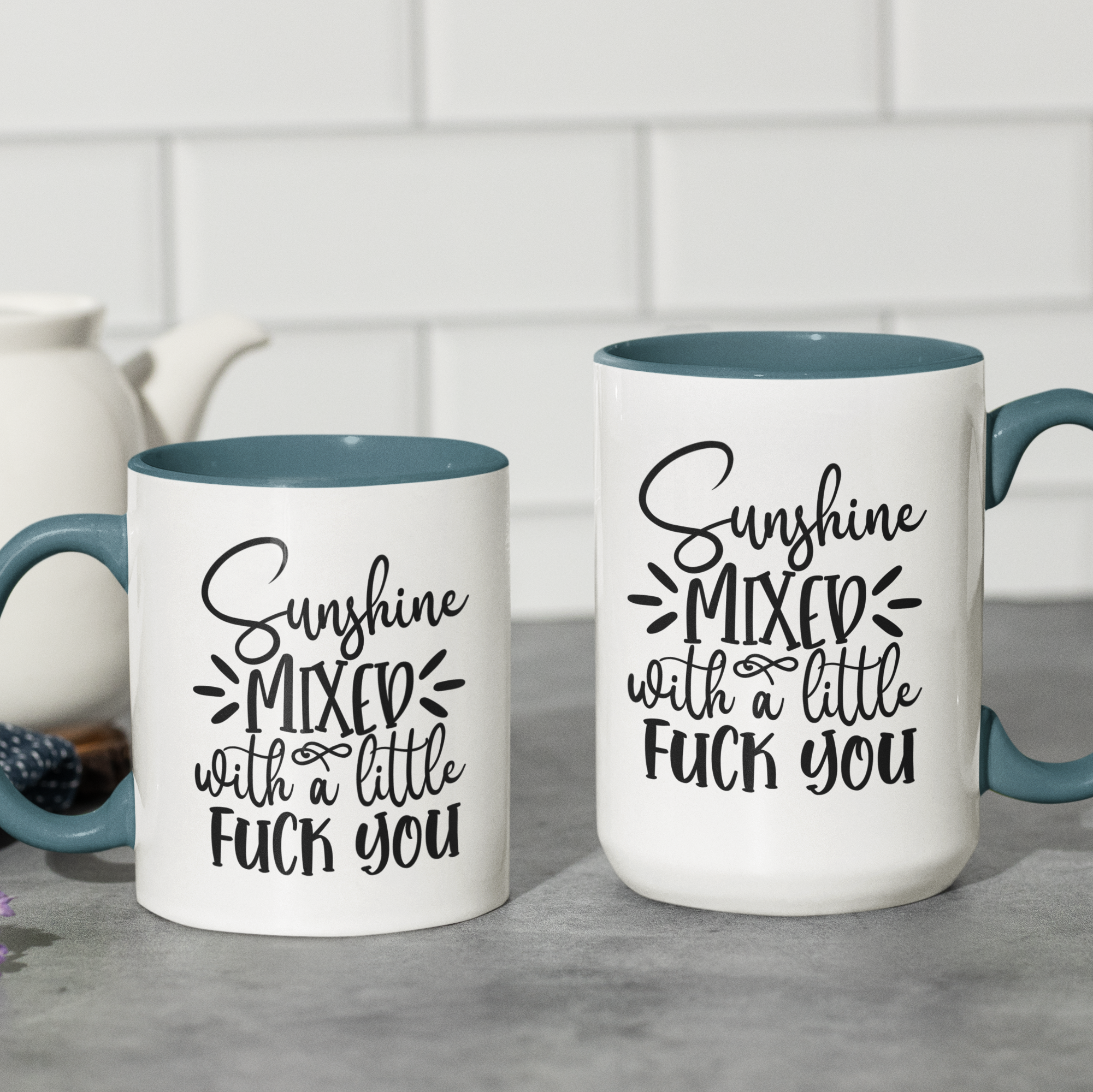 light blue 'Sunshine Mixed with a Little F*** You' ceramic coffee mug, available in 11 oz and 15 oz sizes with bold graphic and blue handle