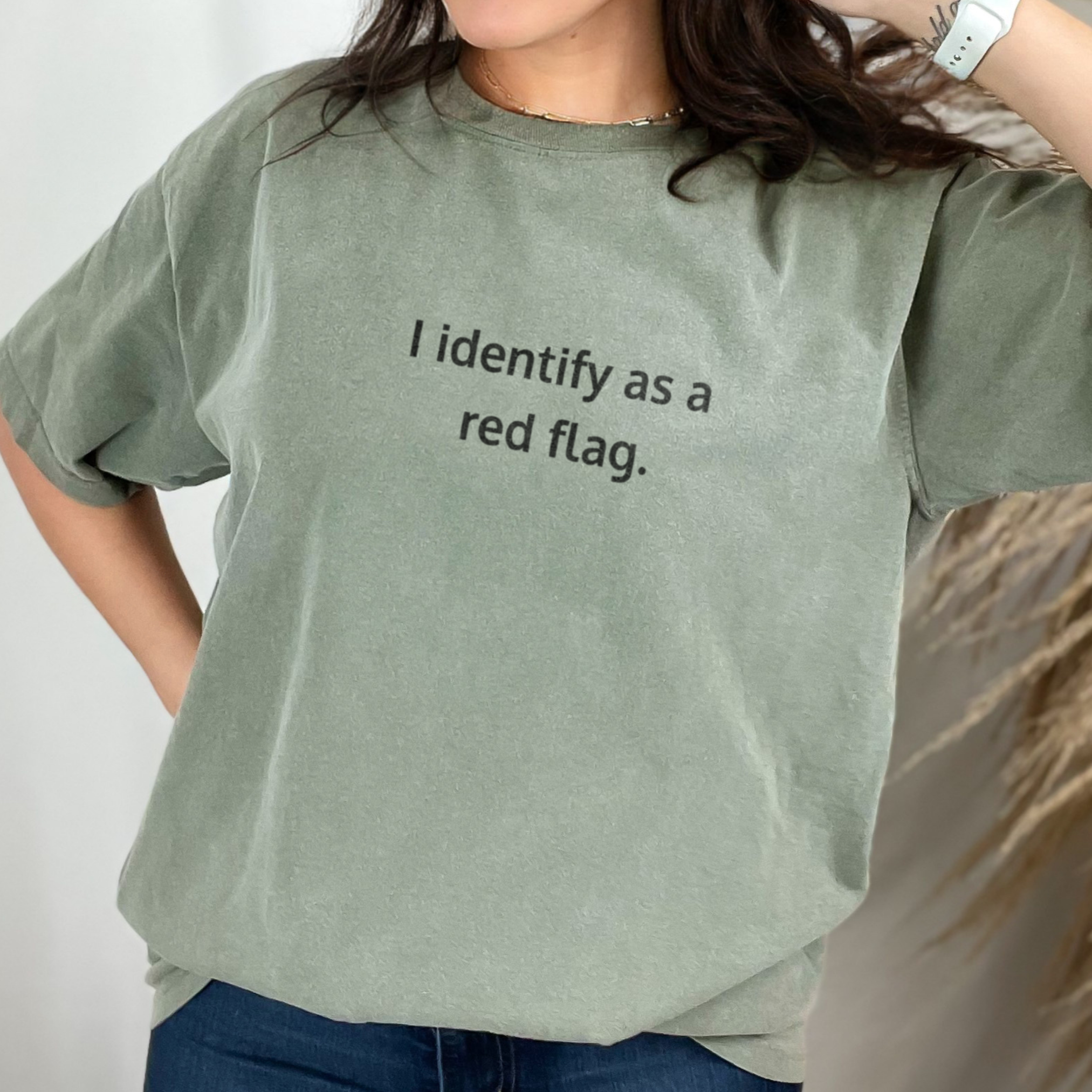 Moss color Comfort Colors t-shirt with “I identify as a red flag” design