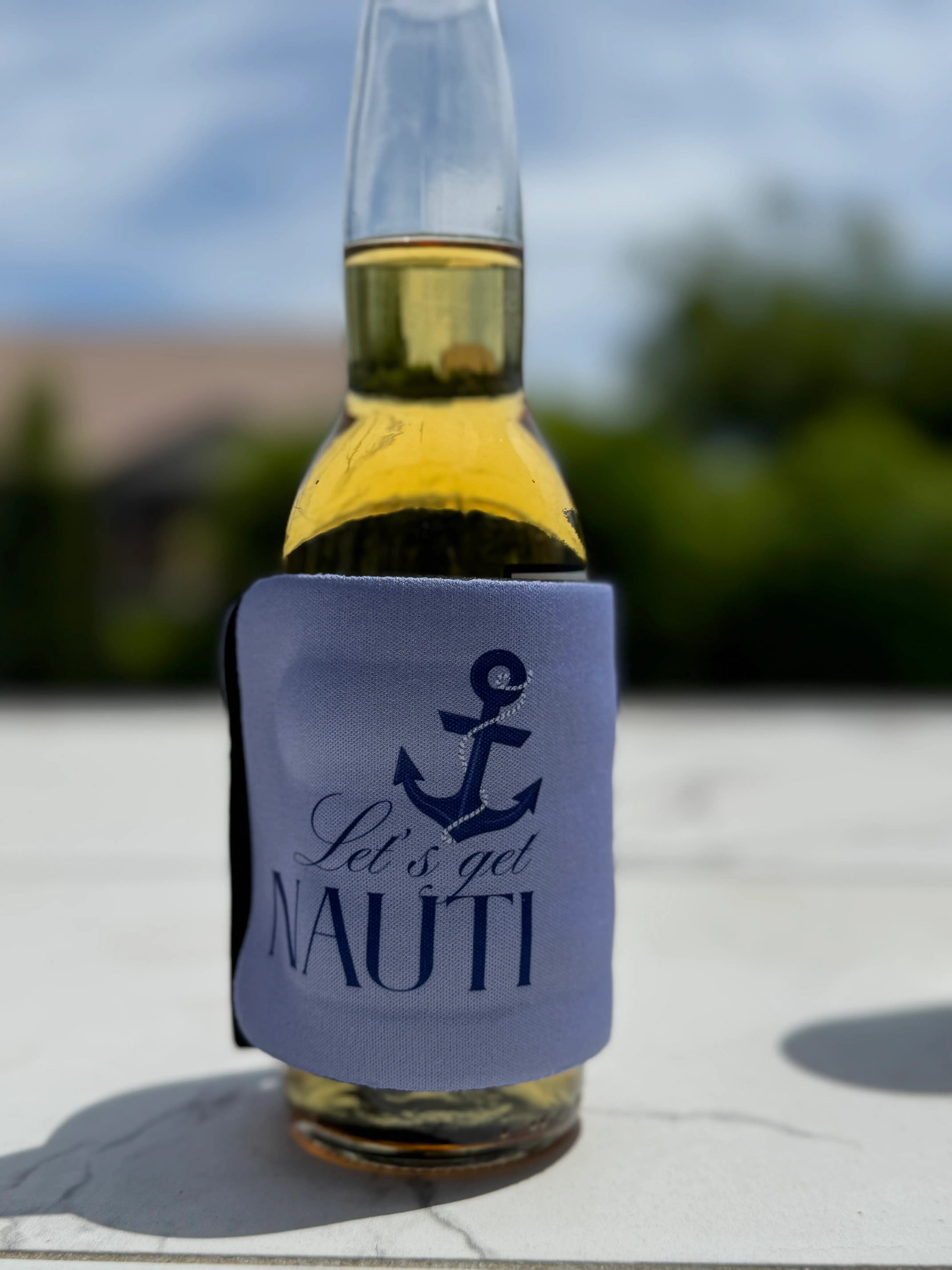 "Let's Get Nauti" personalized slap wrap koozie with anchor design on beer bottle outdoor - custom bachelorette party favor perfect for beach trips