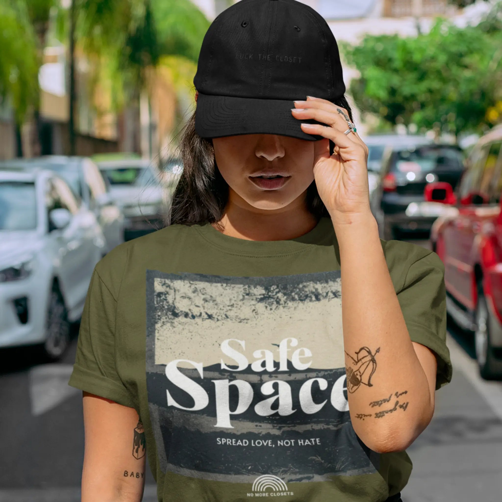 Close-up of embroidered “Fuck the Closet” text on a white cap, LGBTQ pride ally hat