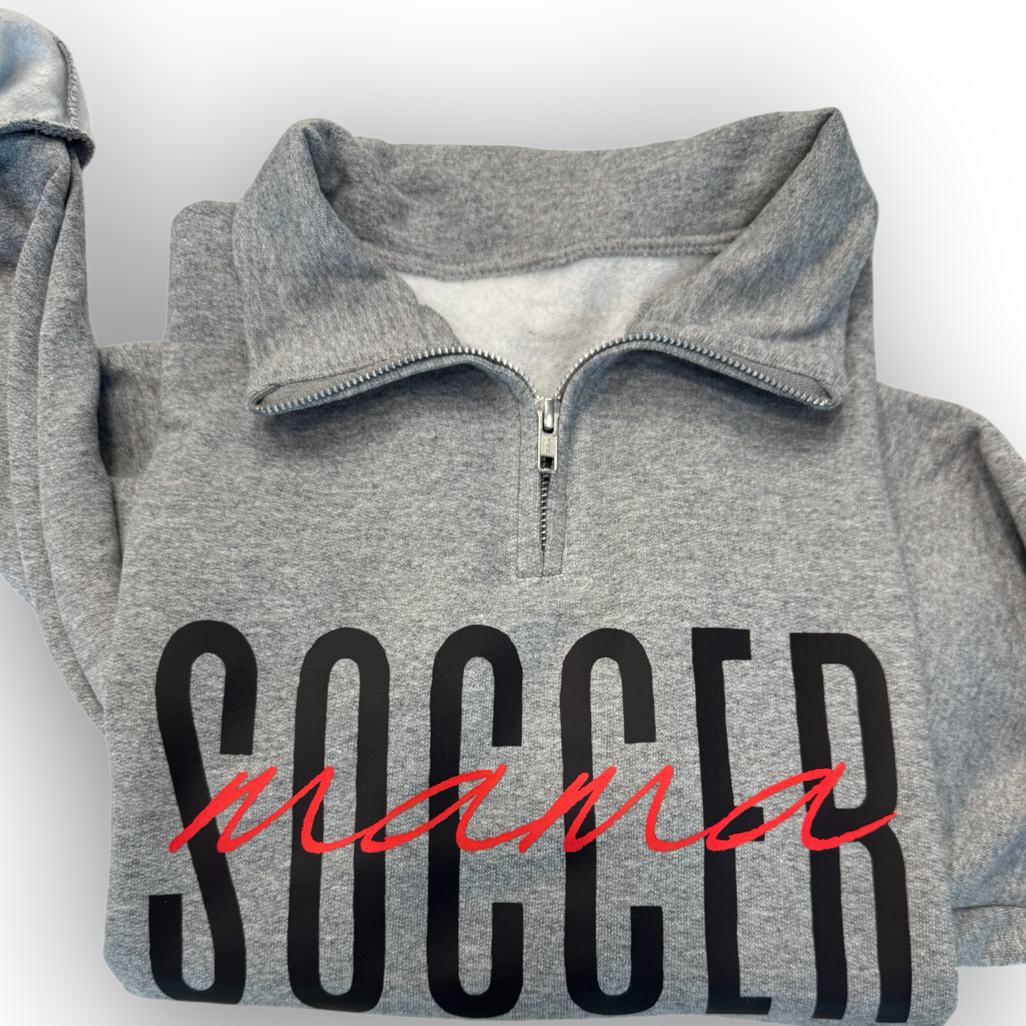 Close up of dark gray Customizable 'Sports Mama' 1/4 zip pullover for soccer moms and sports fans, featuring a soft fabric and stylish design, perfect for game days.