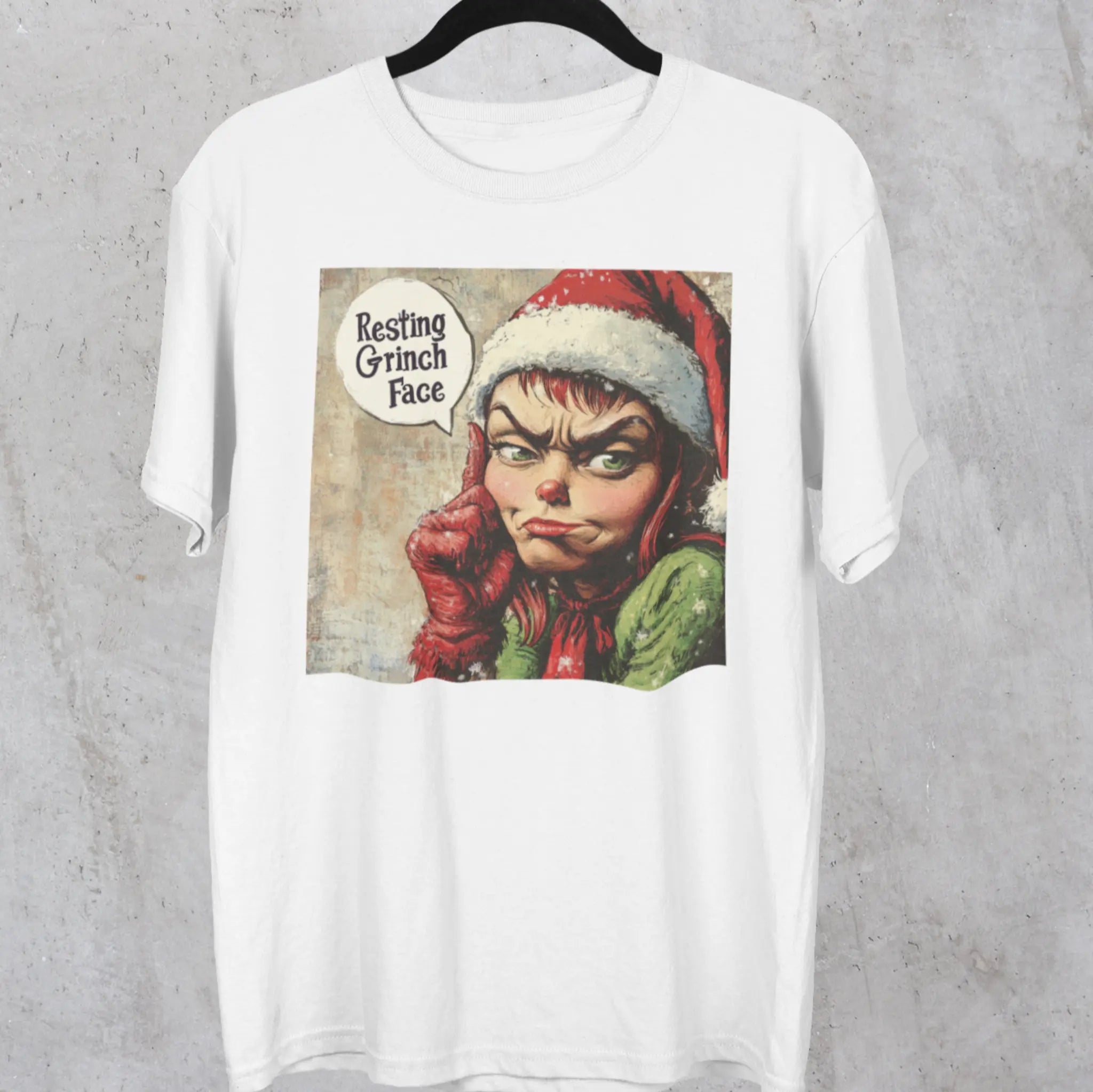 Hanger mockup of "Resting Grinch Face" shirt - funny Christmas Grinch apparel for people who despise holiday cheer