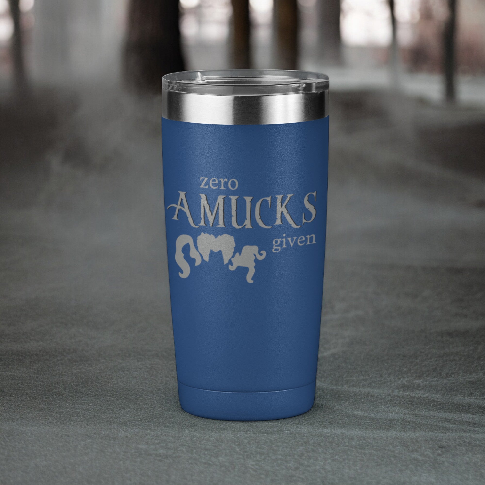 Royal Blue tumbler with silver text that reads "Zero Amucks Given," featuring silhouettes of three witches' hairstyles, perfect for Halloween-themed drinkware.