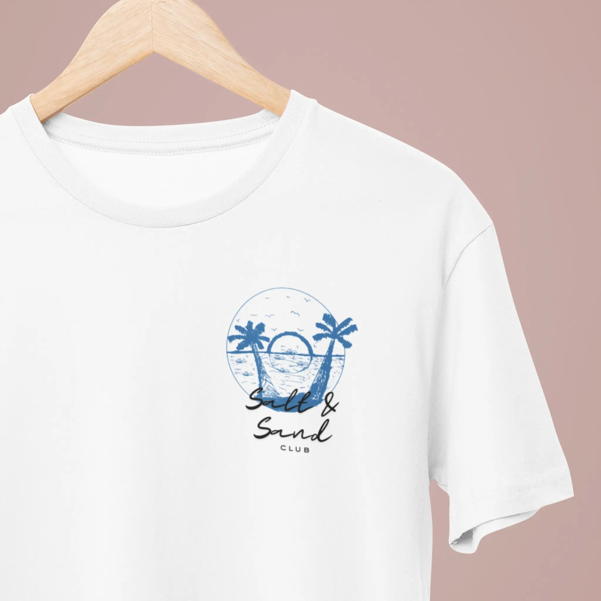 White t-shirt with “Salt & Sand Club” beach graphic featuring palm trees and sunset, coastal summer tee