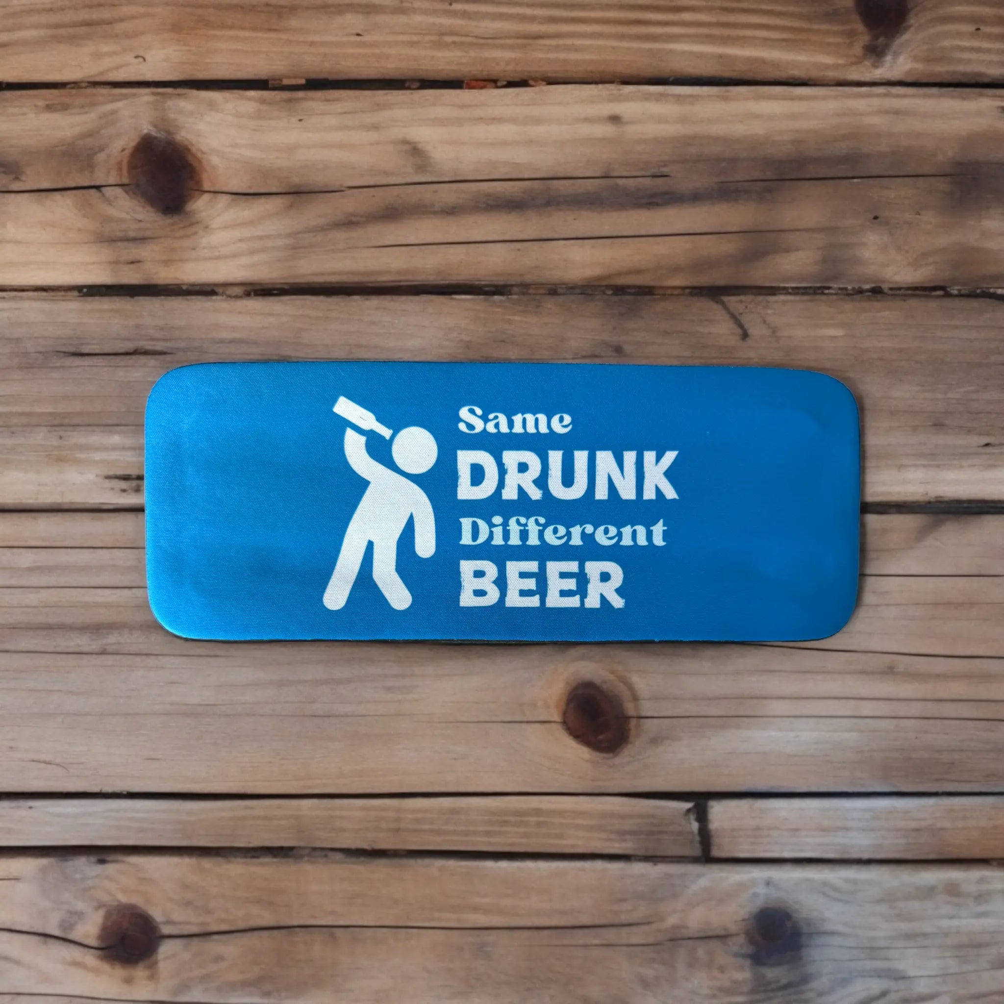 Blue slap wrap koozie with “Same Drunk Different Beer” text, fits most cans or bottles, funny beer can cooler