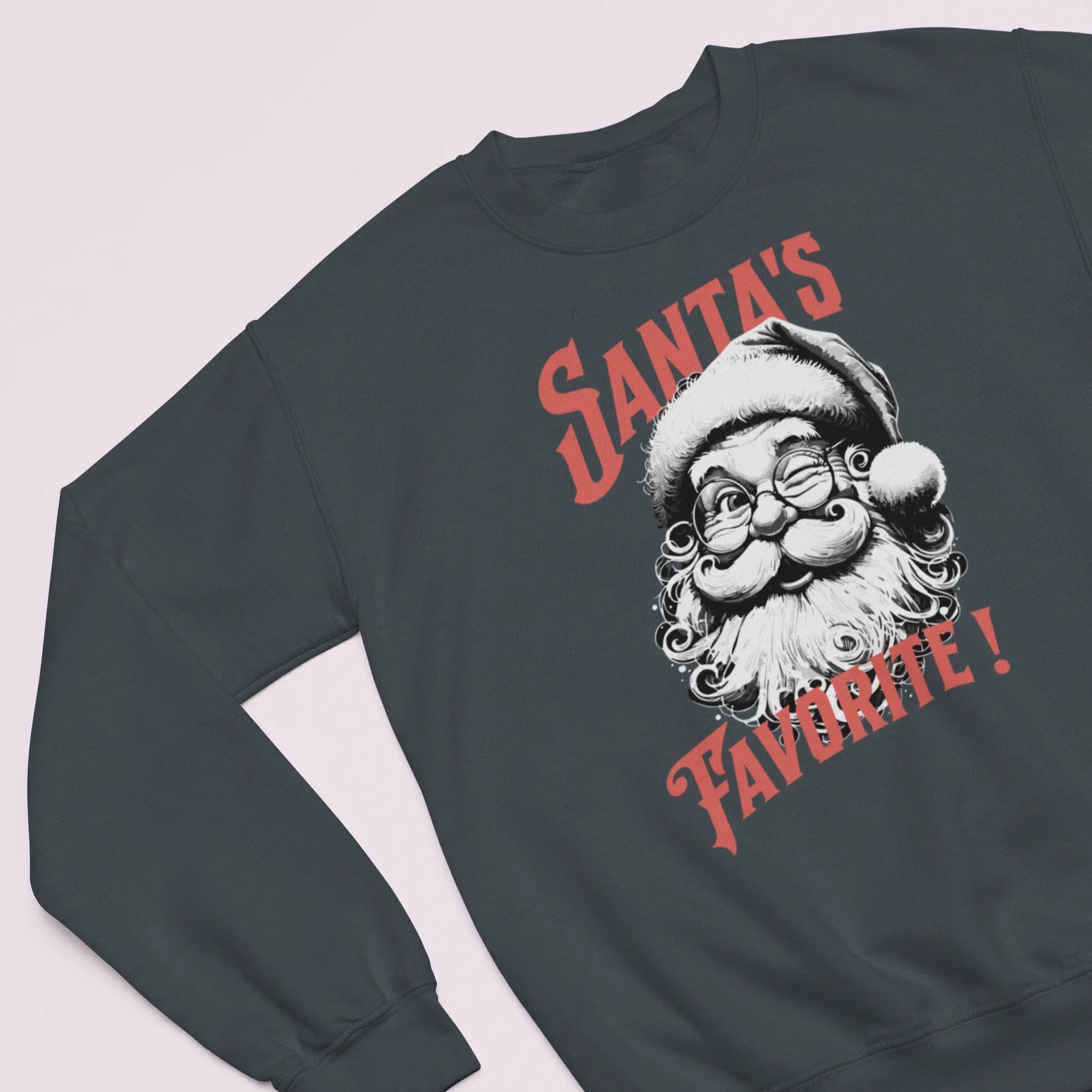 Gray crewneck sweatshirt mockup with Santa face artwork and “Santa’s Favorite!” festive Christmas apparel gift